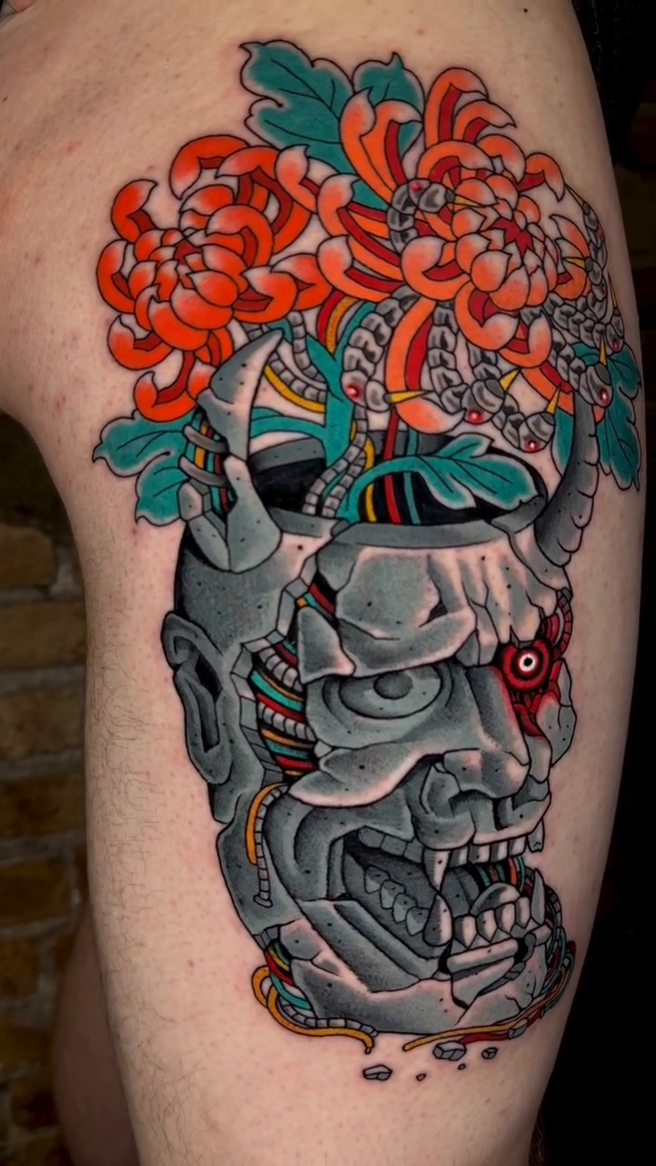 Oni mask with chrysanthemums japanese irezumi tattoo by Hayden Combs
