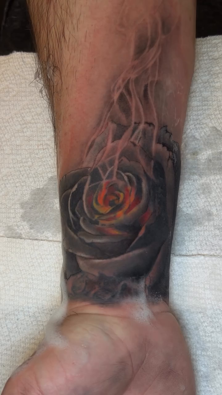 Tattoo by @vudoo_tattoo — realism, black_and_grey