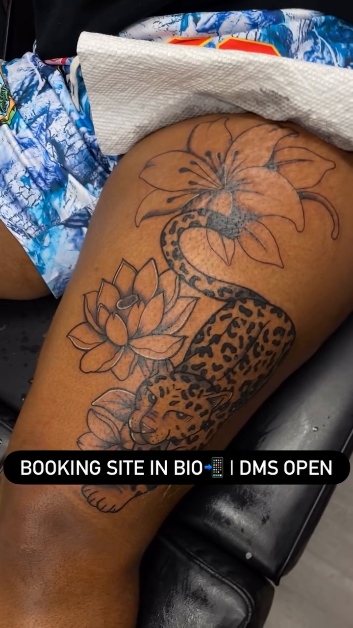 Leopard and lotus flower tattoo realism tattoo on the thigh by Mariš¤, Chicago, Illinois