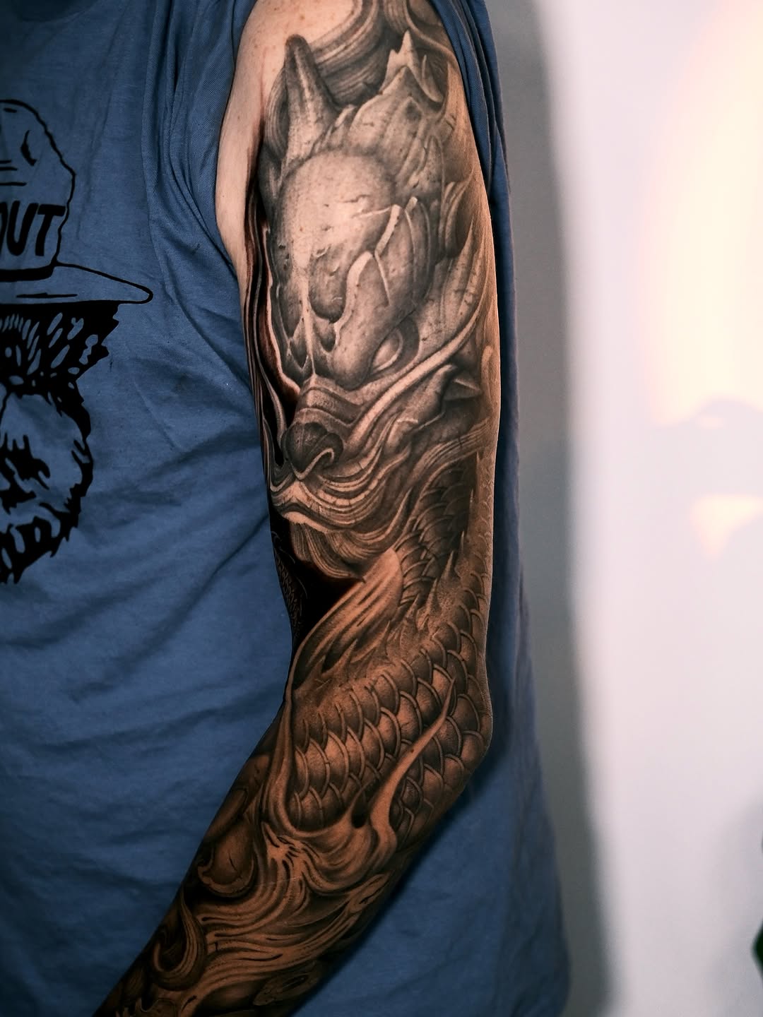 Dragon sleeve Japanese tattoo on the upper arm by Anh Nguyen