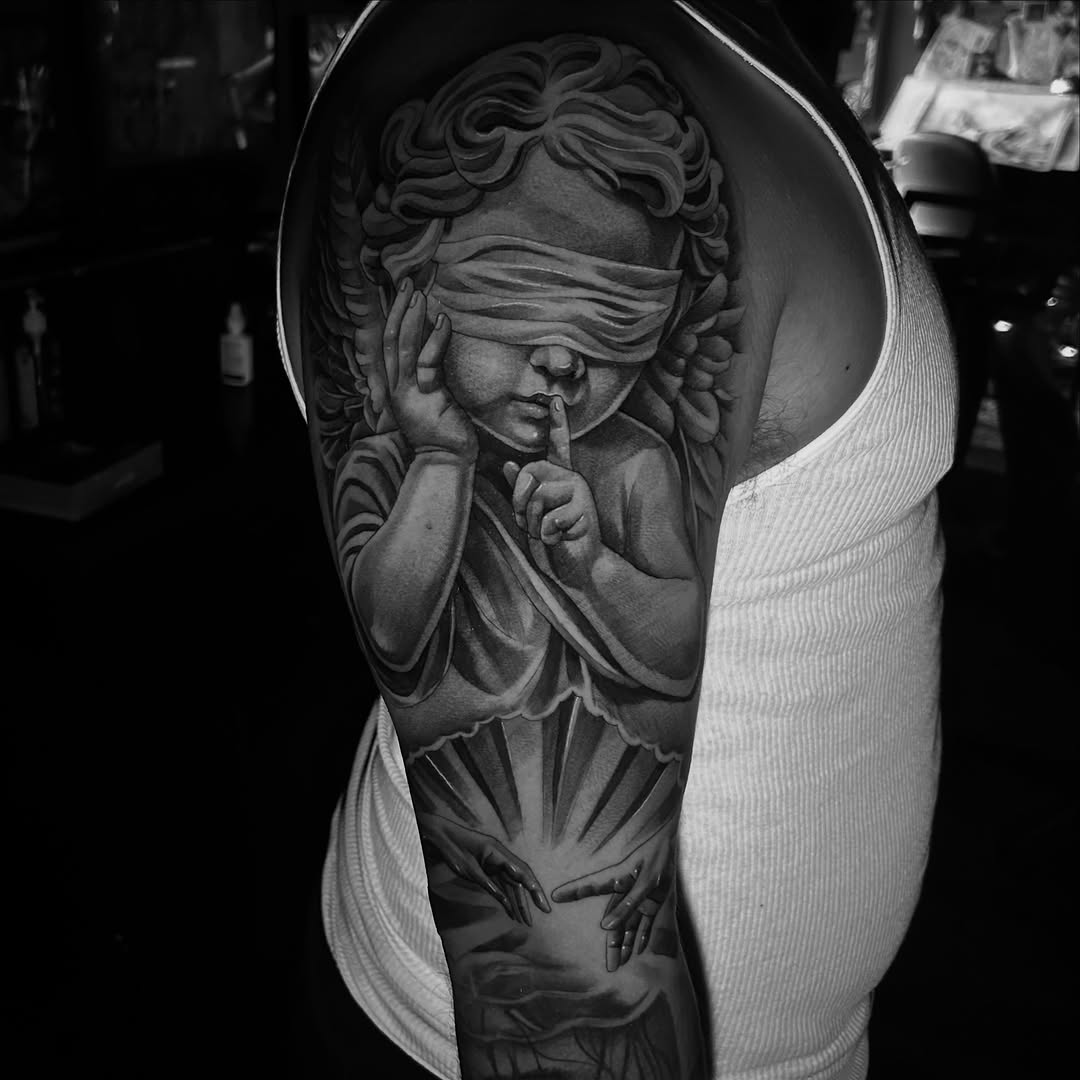 Tattoo by @acruz_707 — realism, black_and_grey