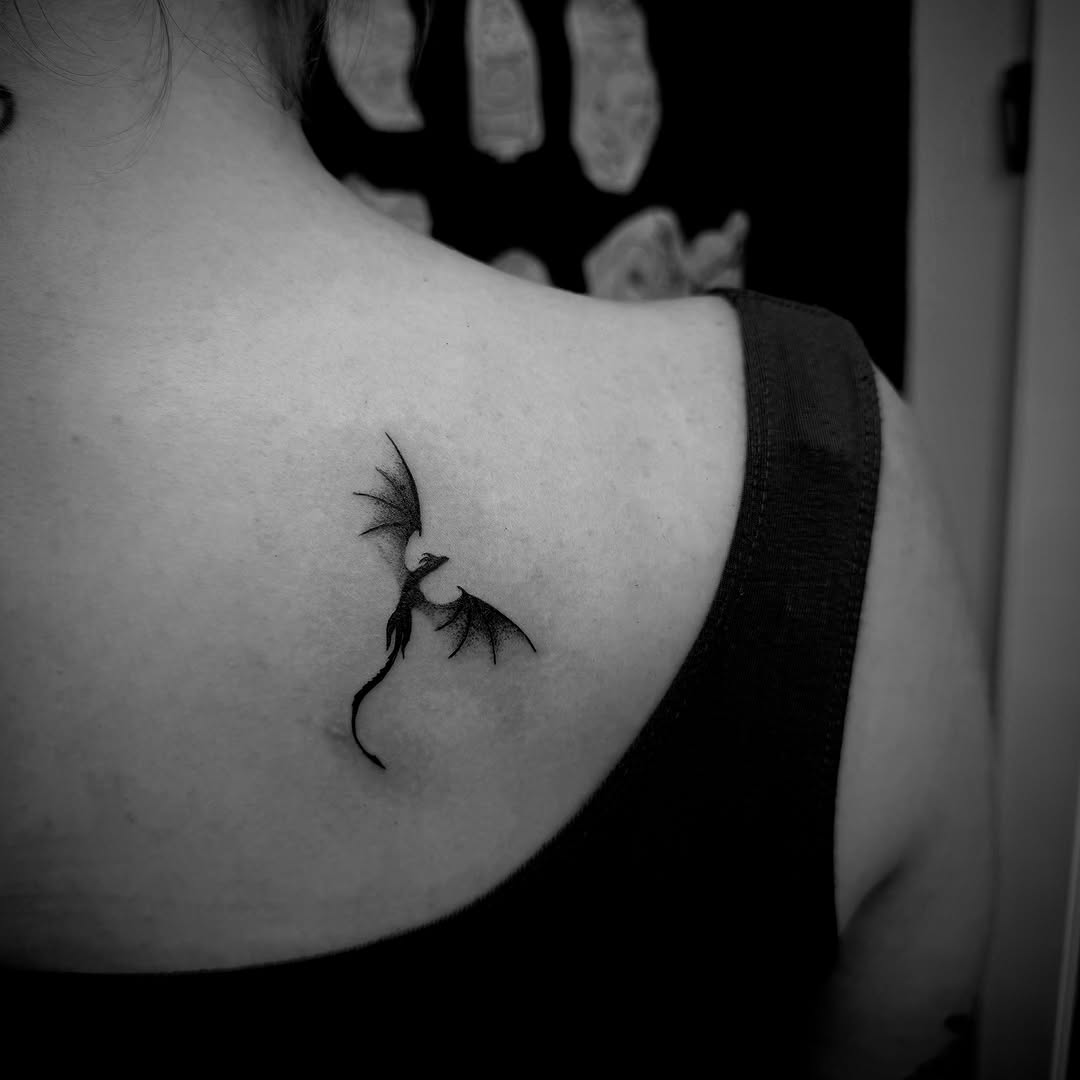 Dragon blackwork tattoo on the shoulder by Kraken ink Tattoo, San Francisco, California