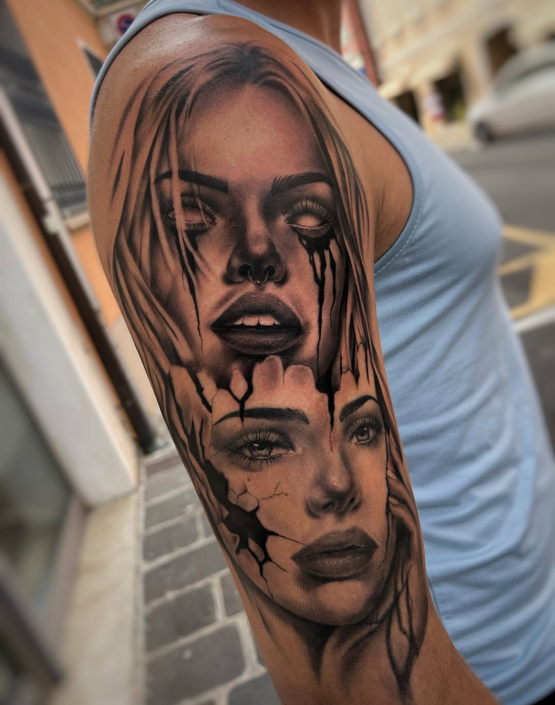 Two faces realism tattoo on the forearm by Blot_Tattoo