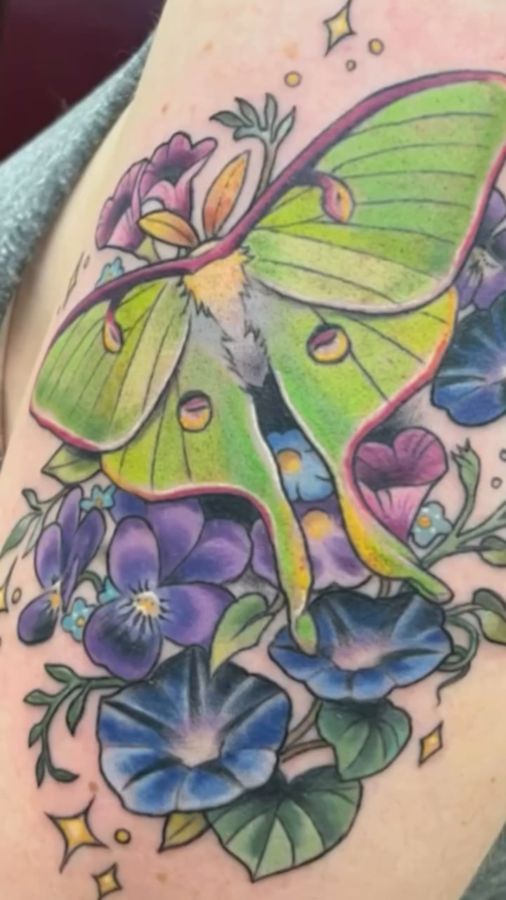 Luna moth with morning glory flowers neo-traditional tattoo on the upper arm by Megan Merrell (Butler)