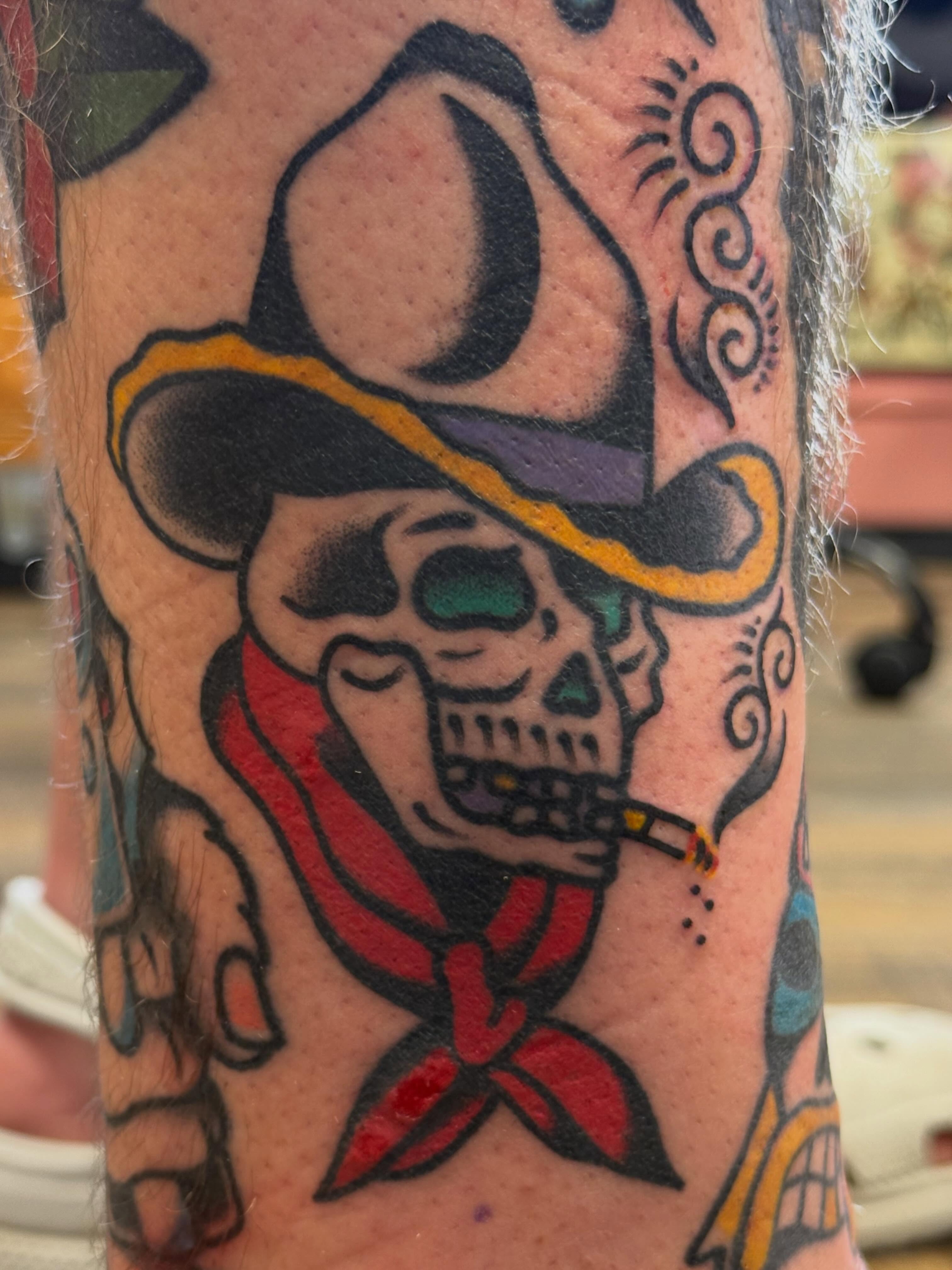 Cowboy skull American traditional tattoo on the forearm by Big Al