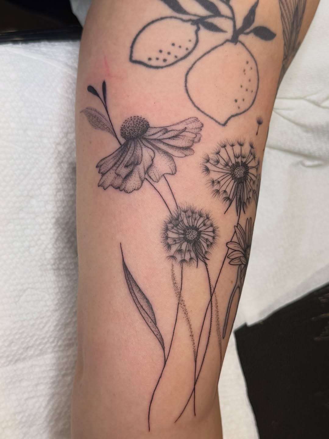Wildflowers and lemons ornamental tattoo on the forearm by WhoisLaineyTattoos