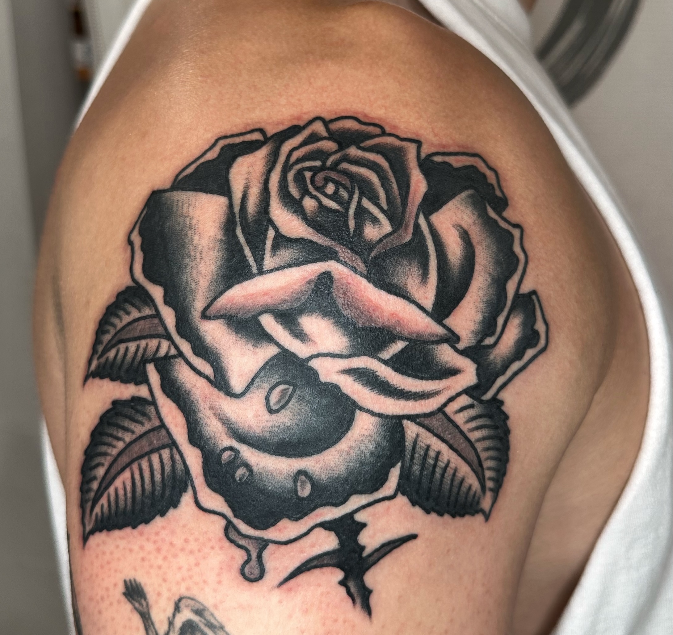 Rose black and grey tattoo on the shoulder by Brock Johnson