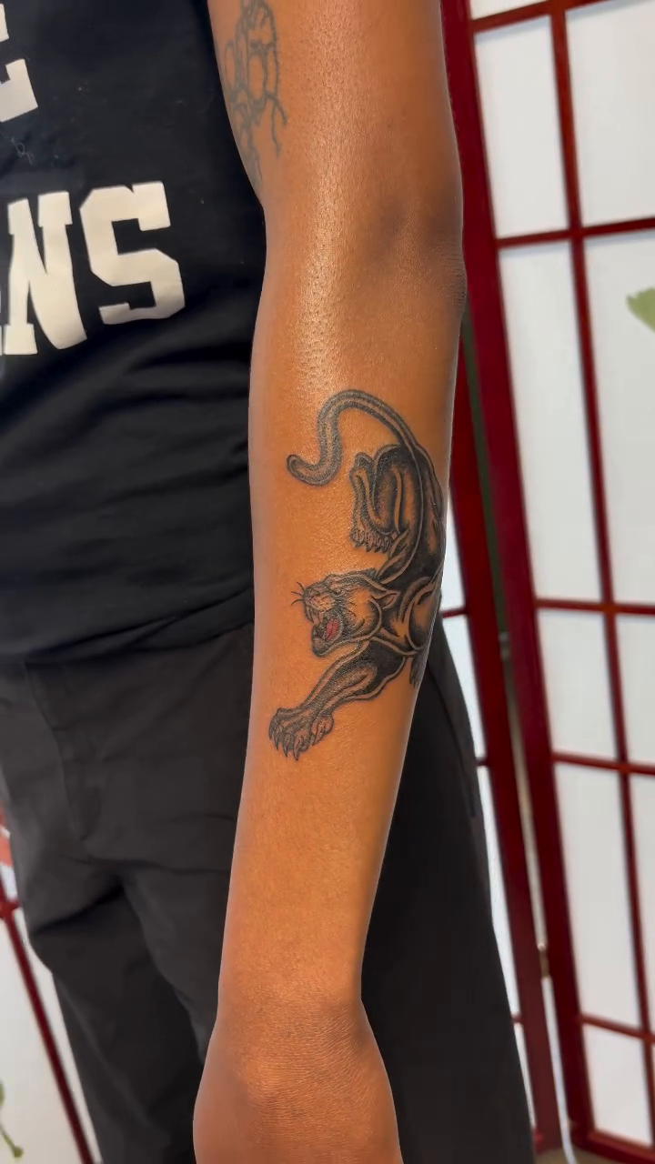 Panther tattoo realism tattoo on the forearm by CJ