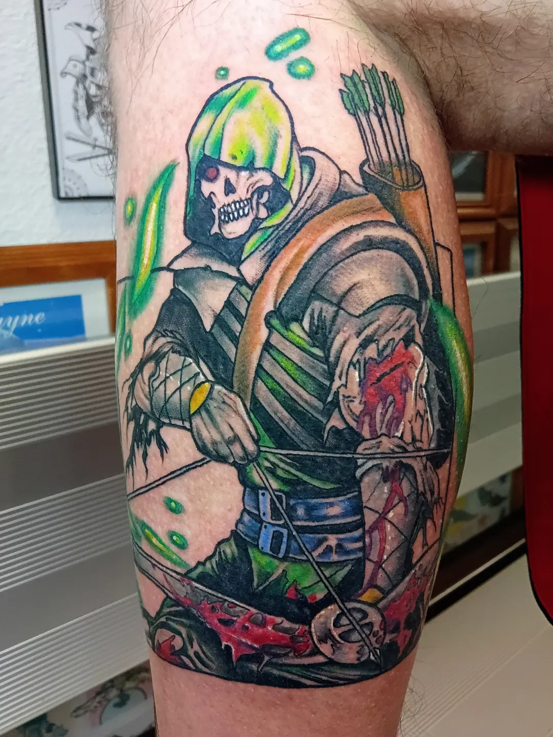 Archer American traditional tattoo on the thigh by Rando Rad