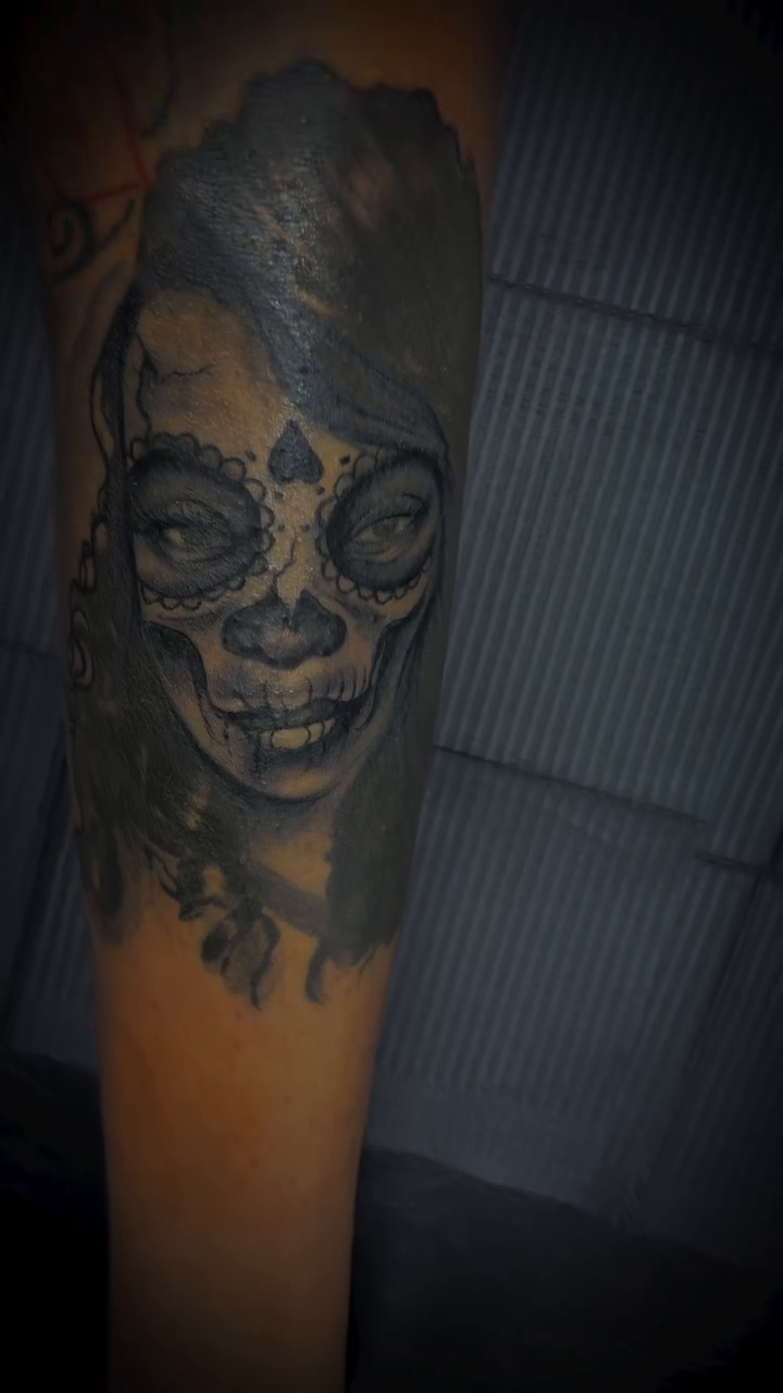 Sugar skull woman realism tattoo by Devin Johnson, Forest Park, Georgia