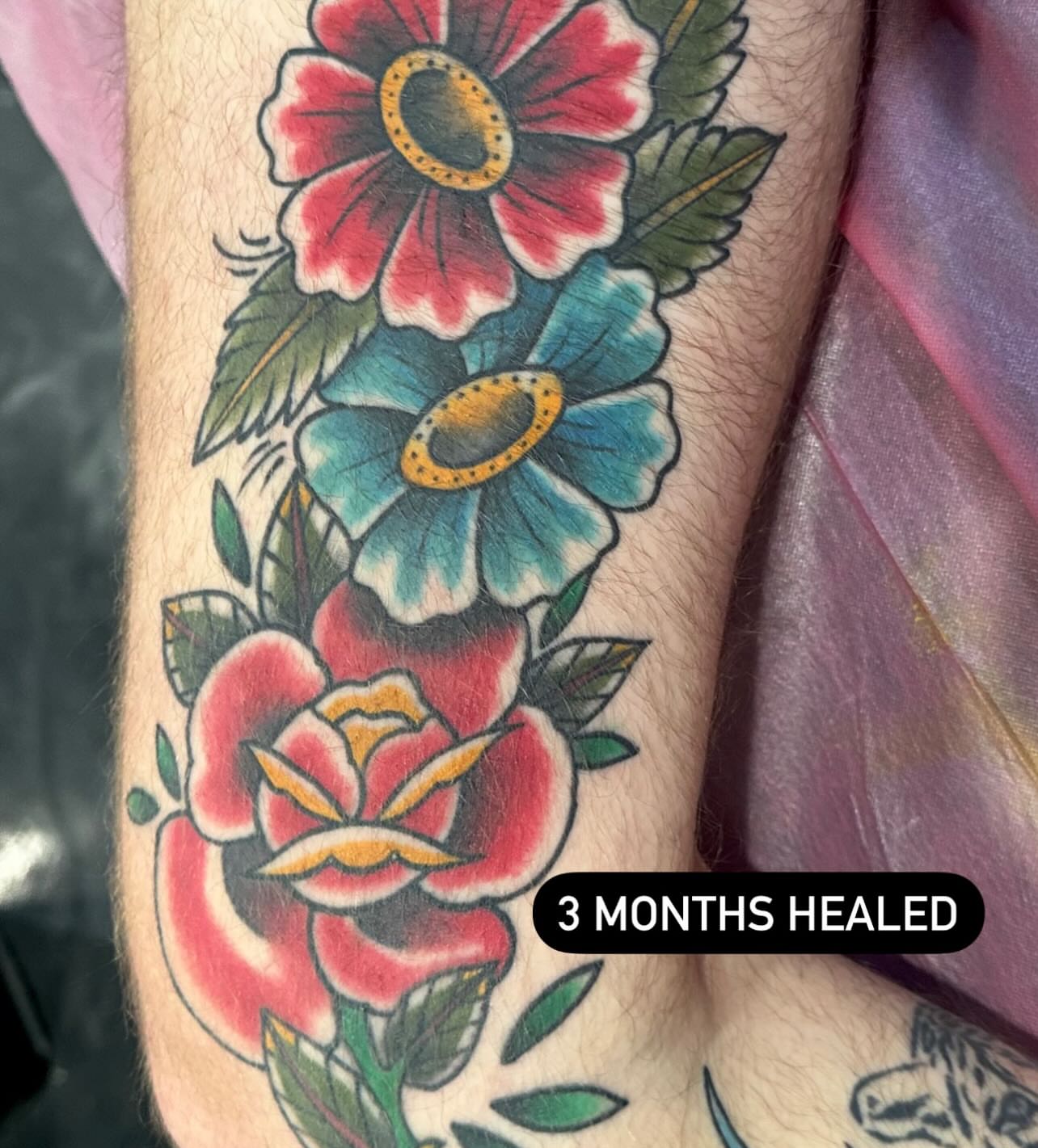 Floral arrangement American traditional tattoo on the forearm by Destiny Tolman