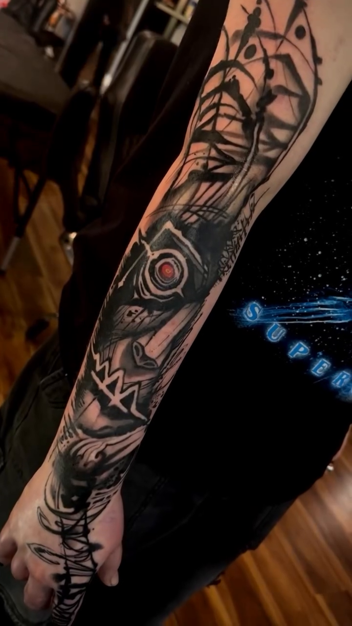 Abstract blackwork sleeve realism tattoo on the back by David goldstein