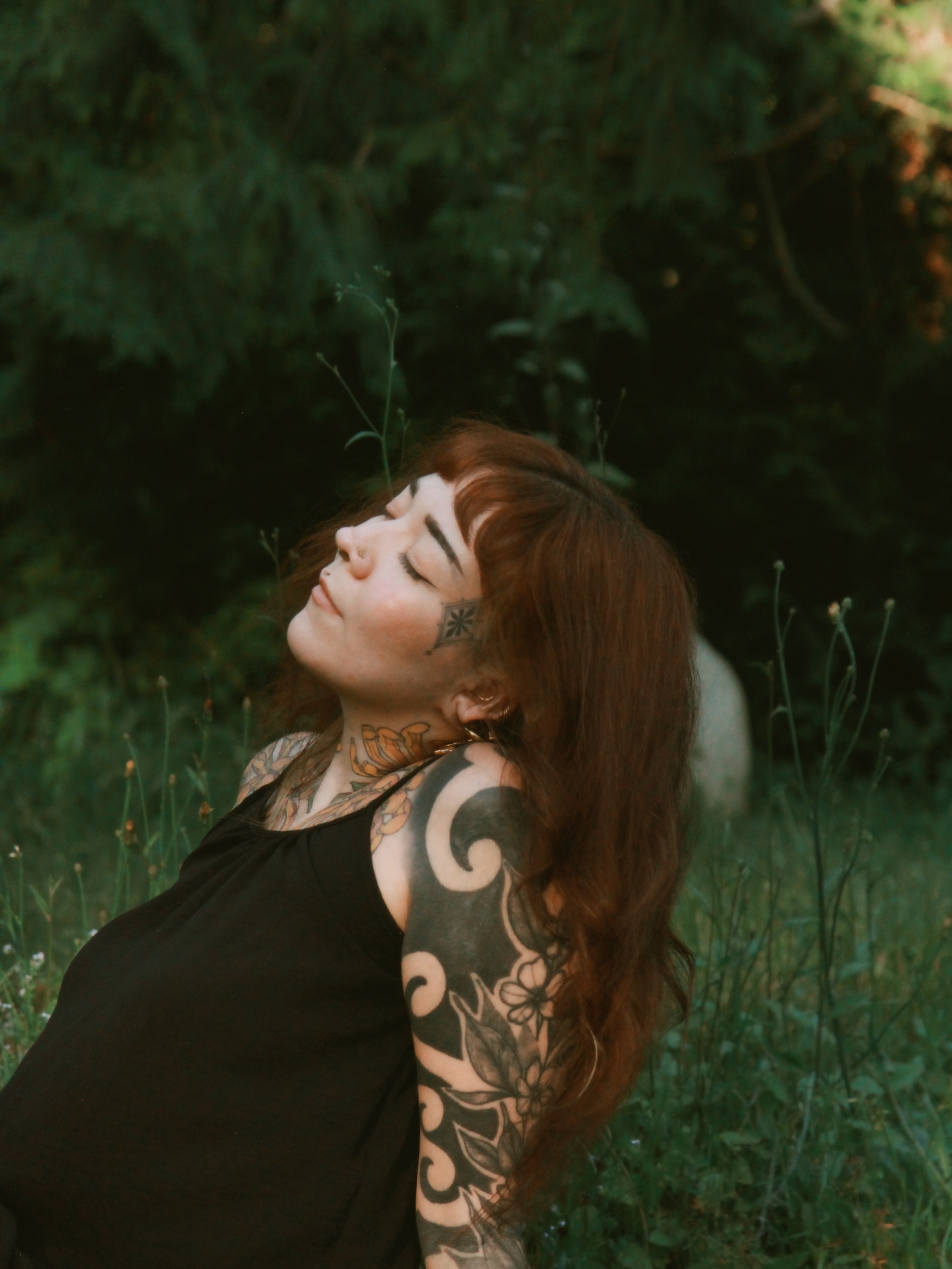 Floral black and grey tattoo on the upper arm by Rebecca Joy ❋ Tattoo Artist