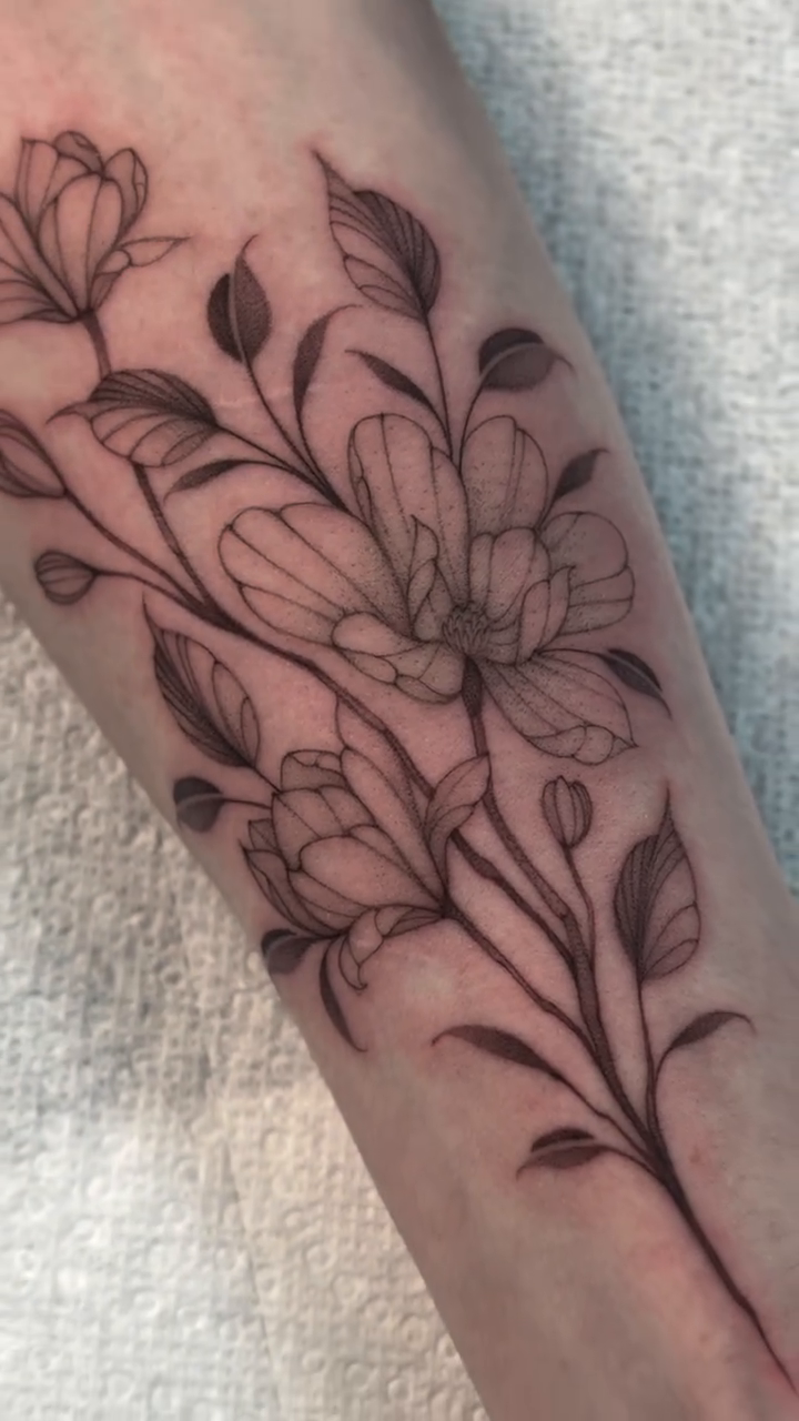 Floral branch tattoo dotwork tattoo on the forearm by Victoria Lamorte