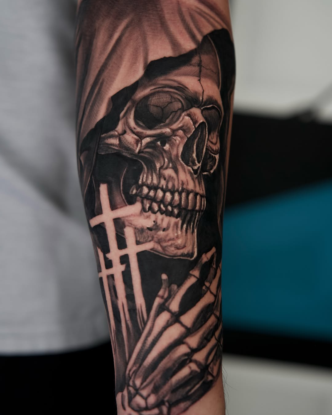 Realism tattoo on the forearm by Travis