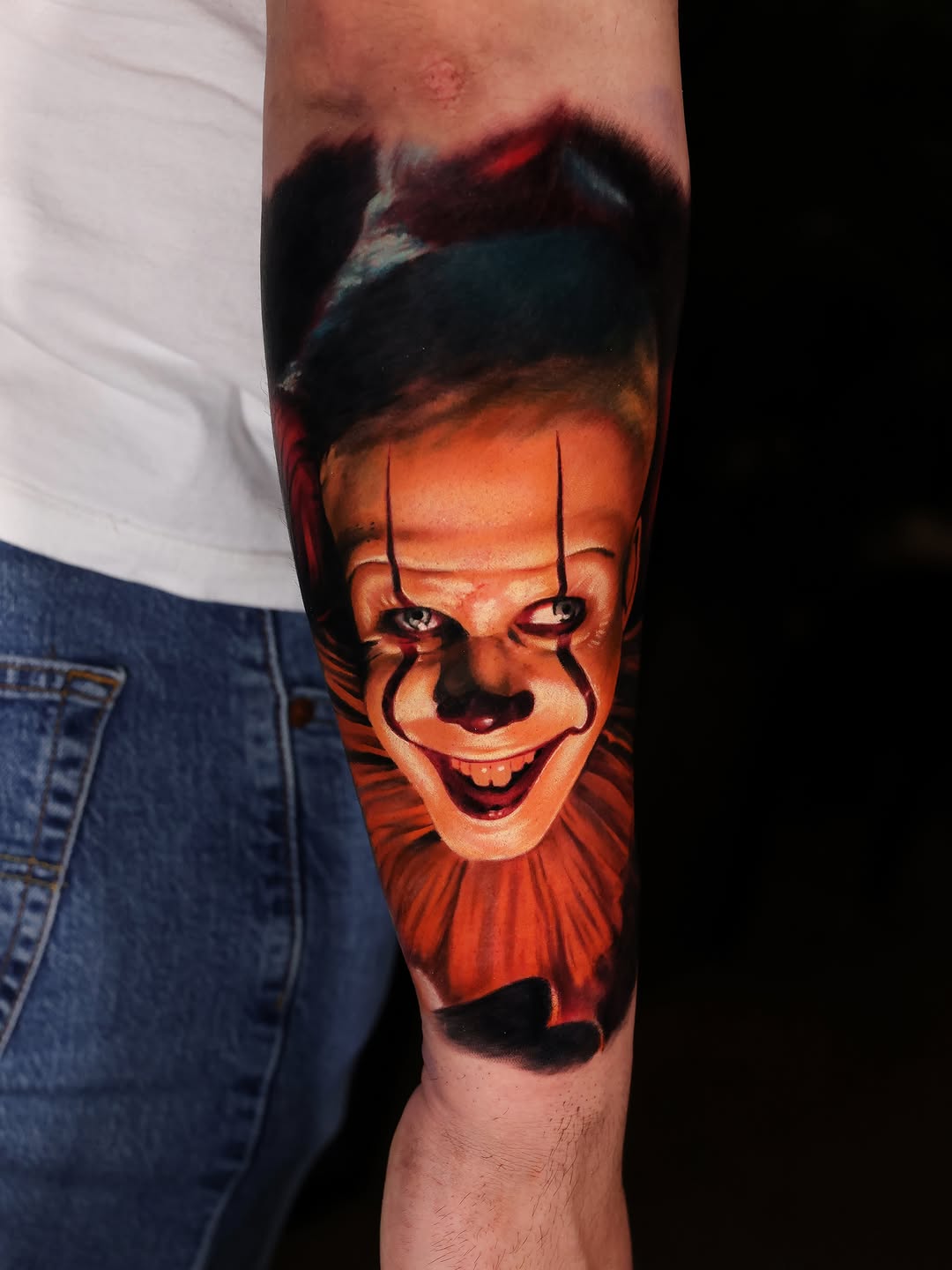 Pennywise the clown realism tattoo on the forearm by Alex Moro