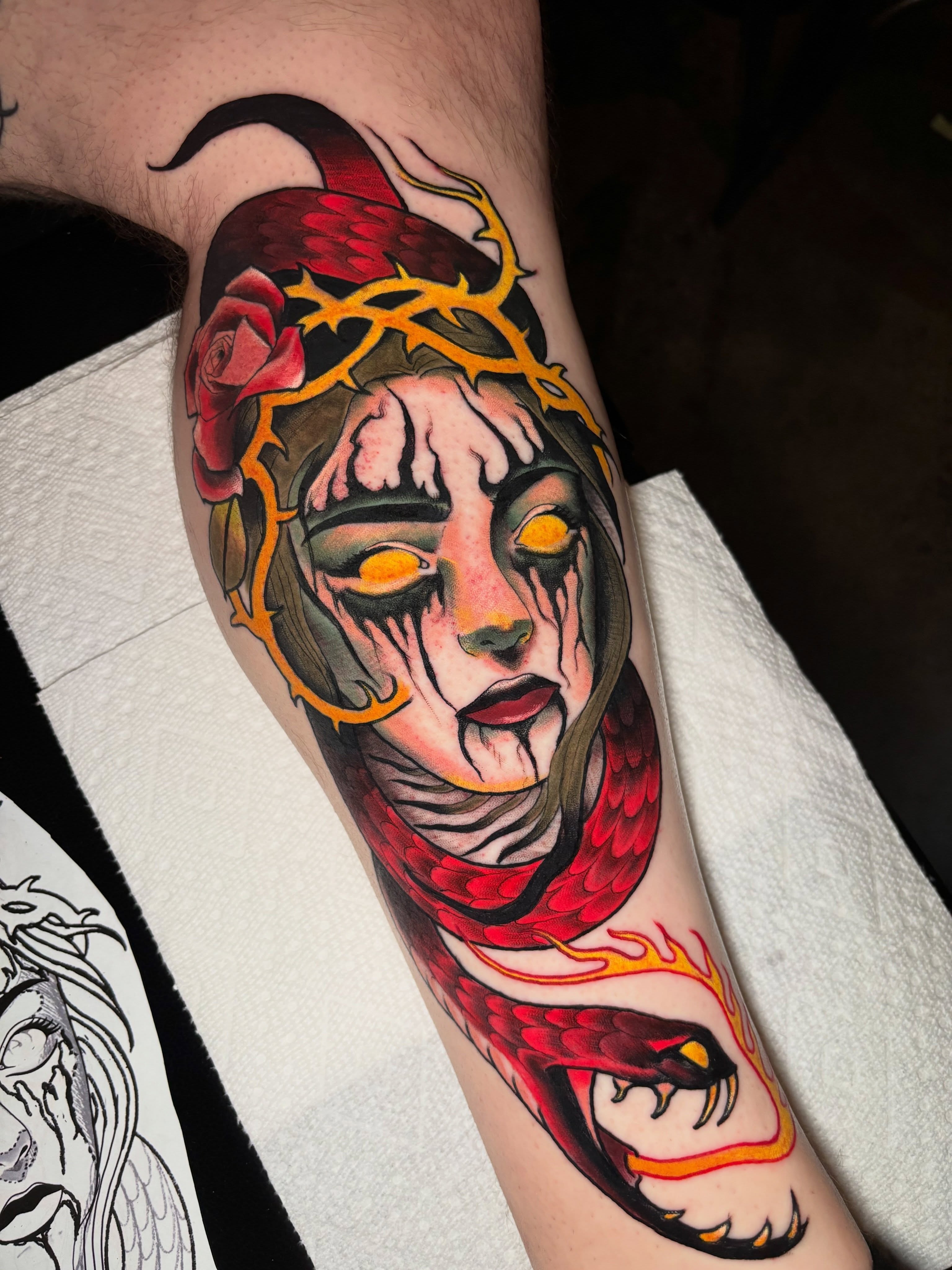 Woman with snake American traditional tattoo on the forearm by Matt Stolzenburg
