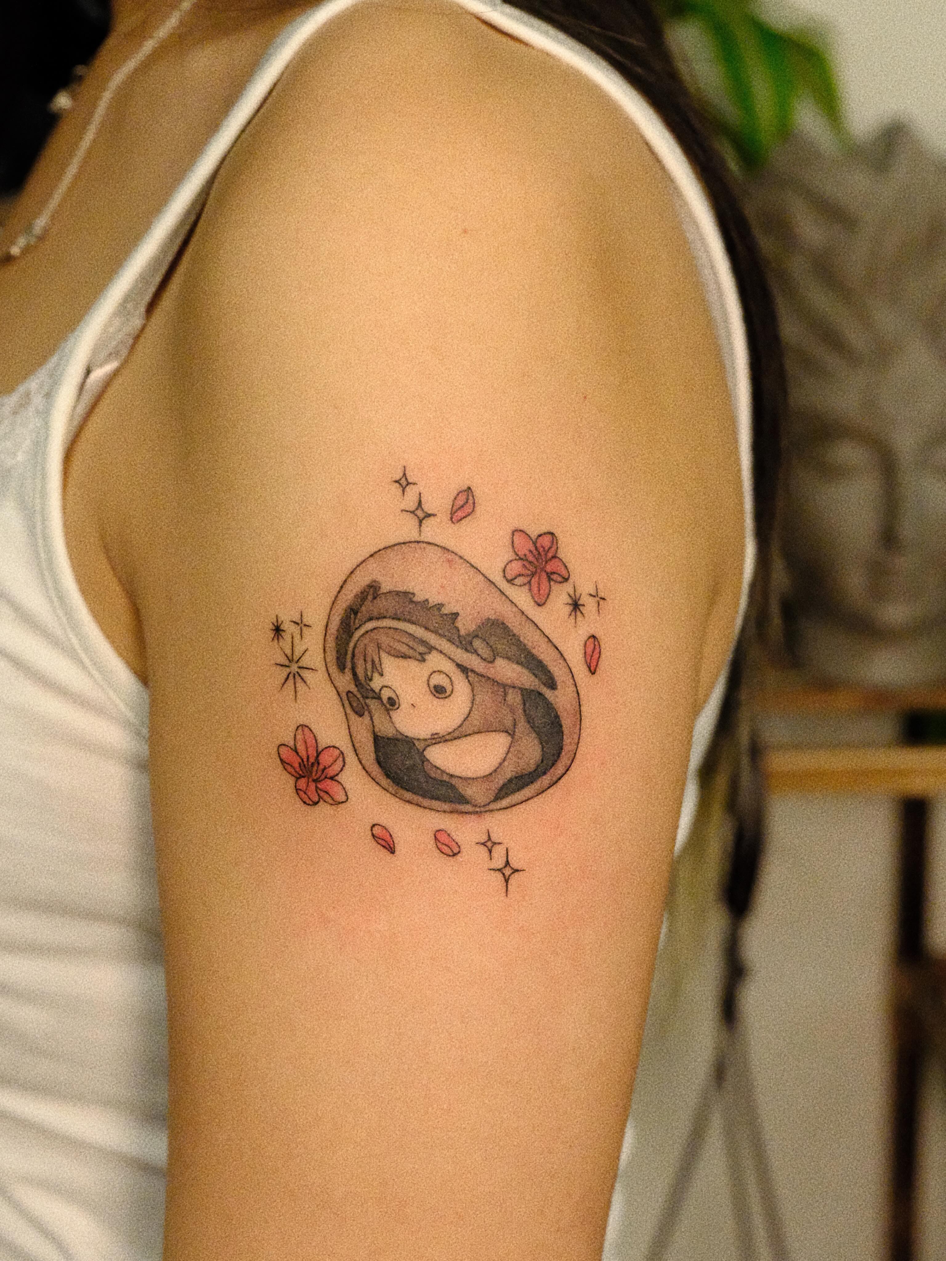 Anime character anime tattoo on the shoulder by rita_tattooist