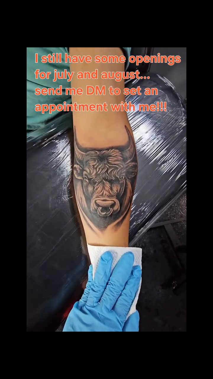 Bull's head portrait realism tattoo on the forearm by Mac Obaob
