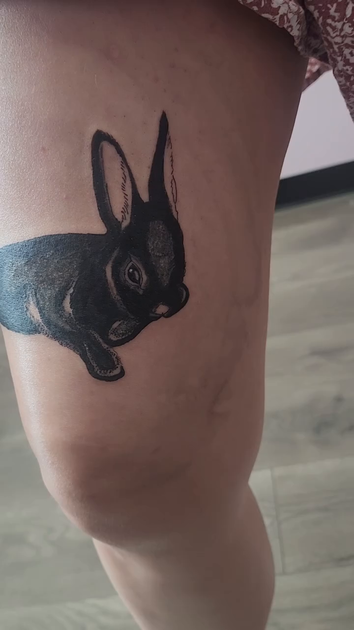 Black rabbit tattoo fine line tattoo on the leg by Meredith 🎈 Tattoo the Bride ✝️