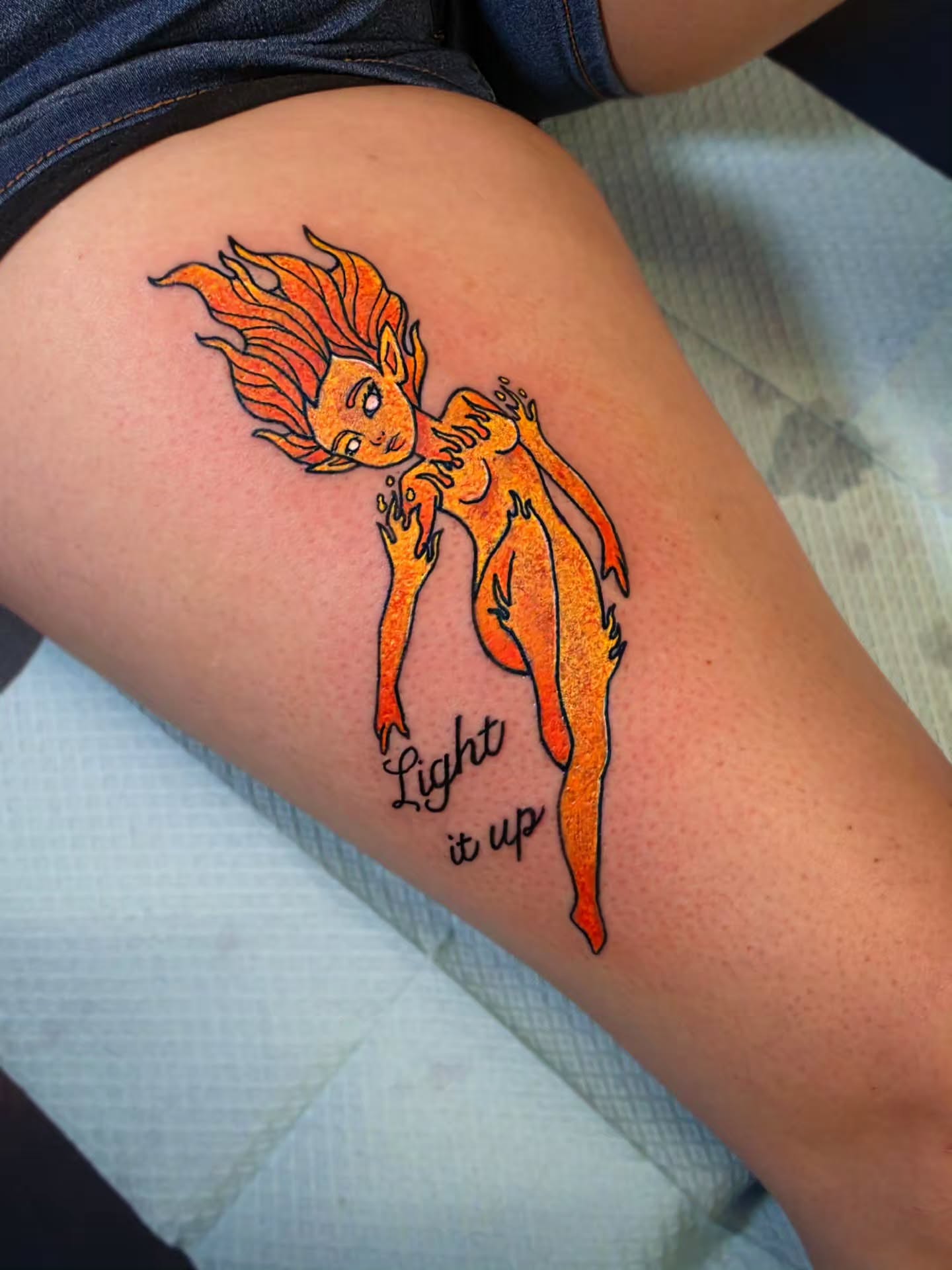 Flame girl illustrative tattoo on the thigh by DFW