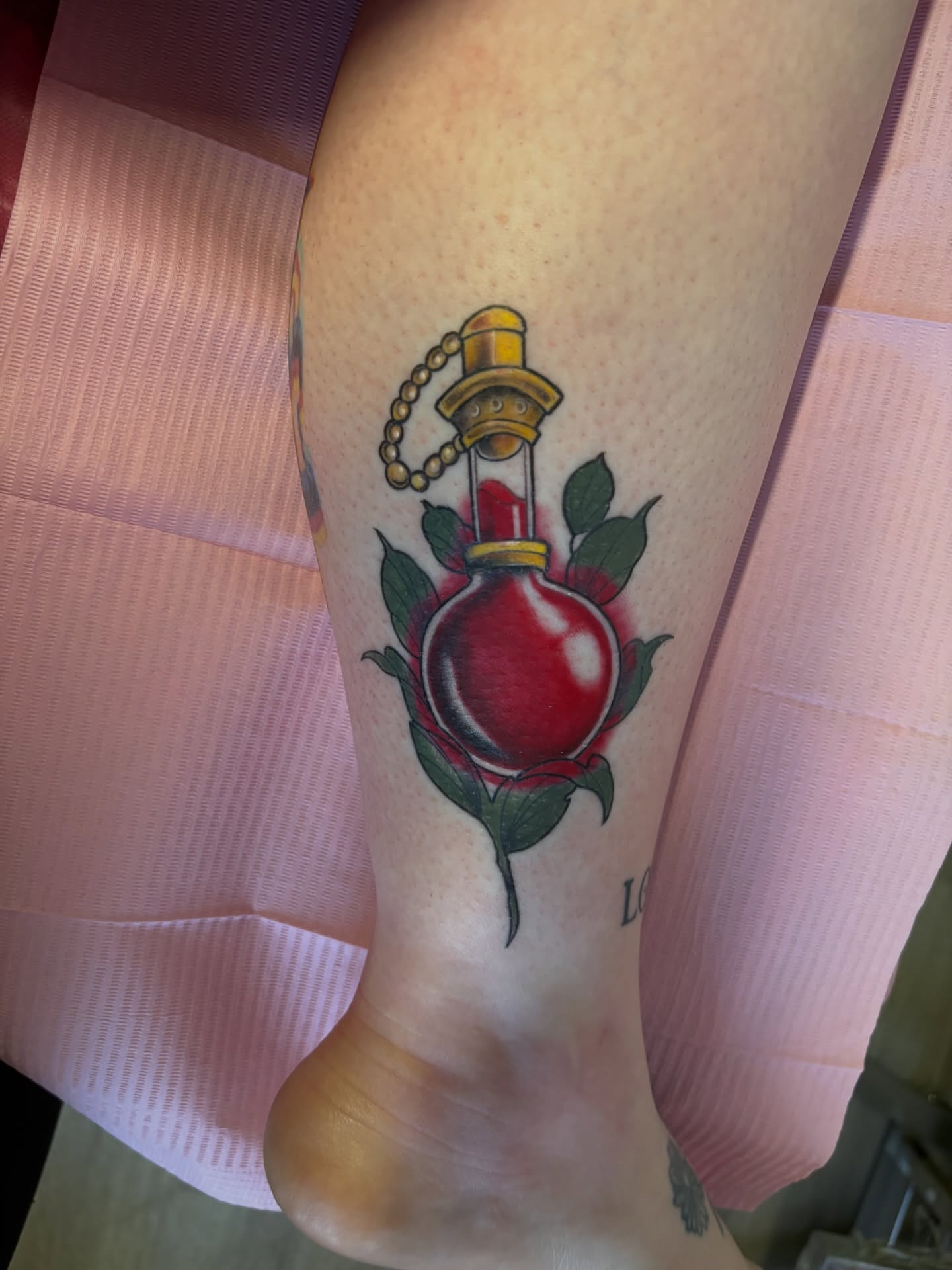 Hourglass and rose realism tattoo on the leg by Elixabeth