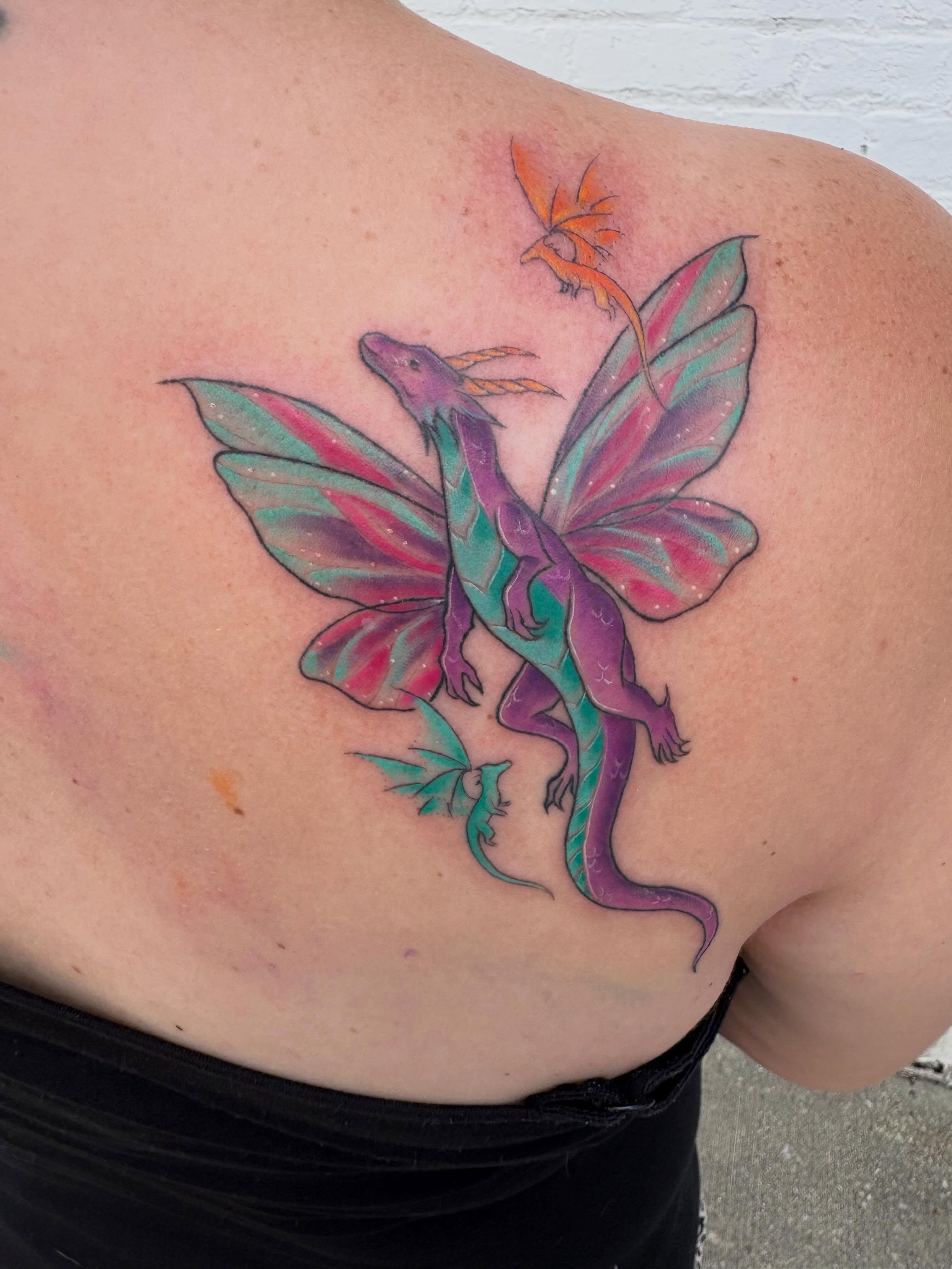 Fairy dragon new school tattoo on the shoulder by Andrea 🎨🖌