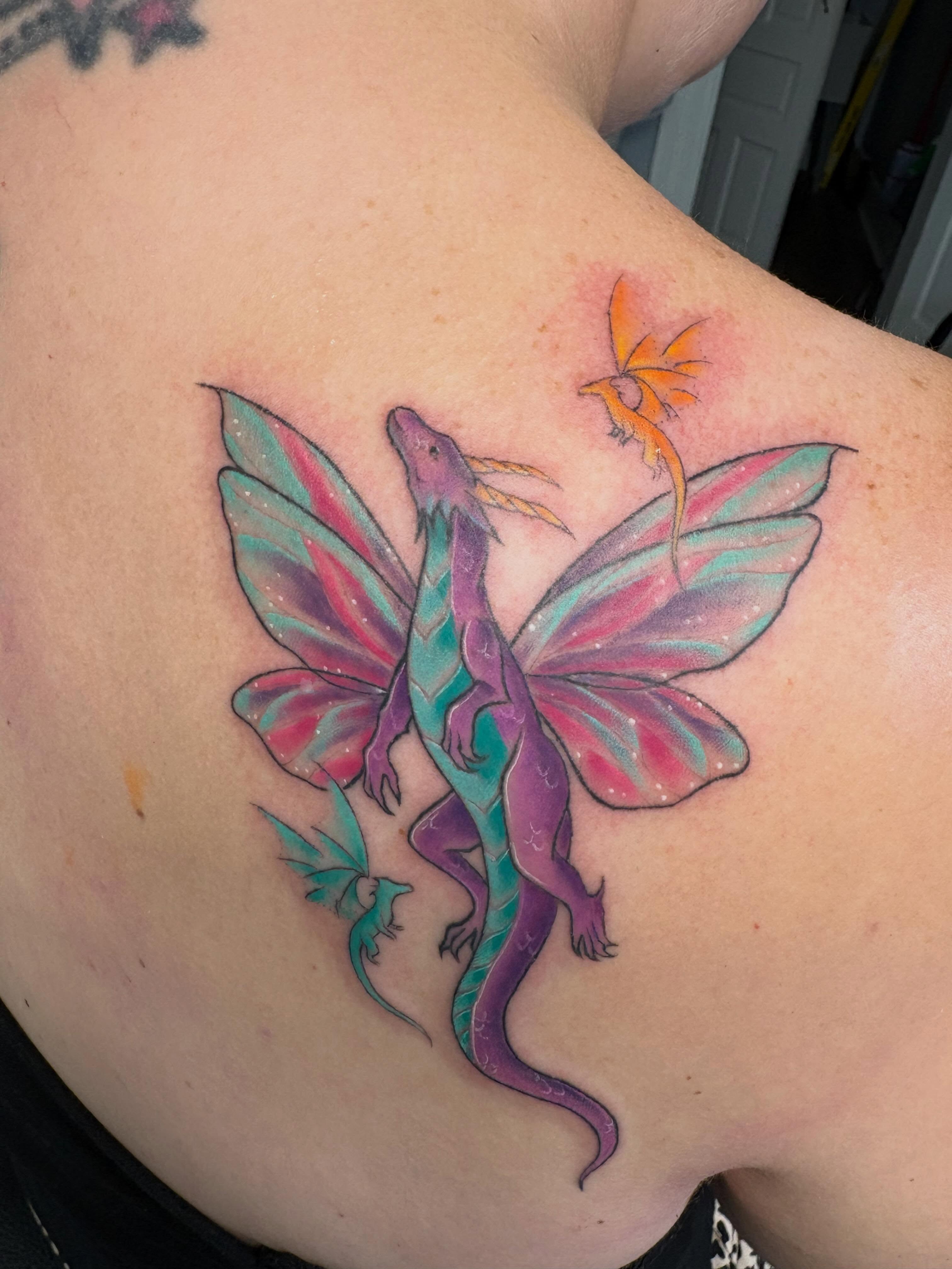 Fairy dragon new school tattoo on the shoulder by Andrea 🎨🖌