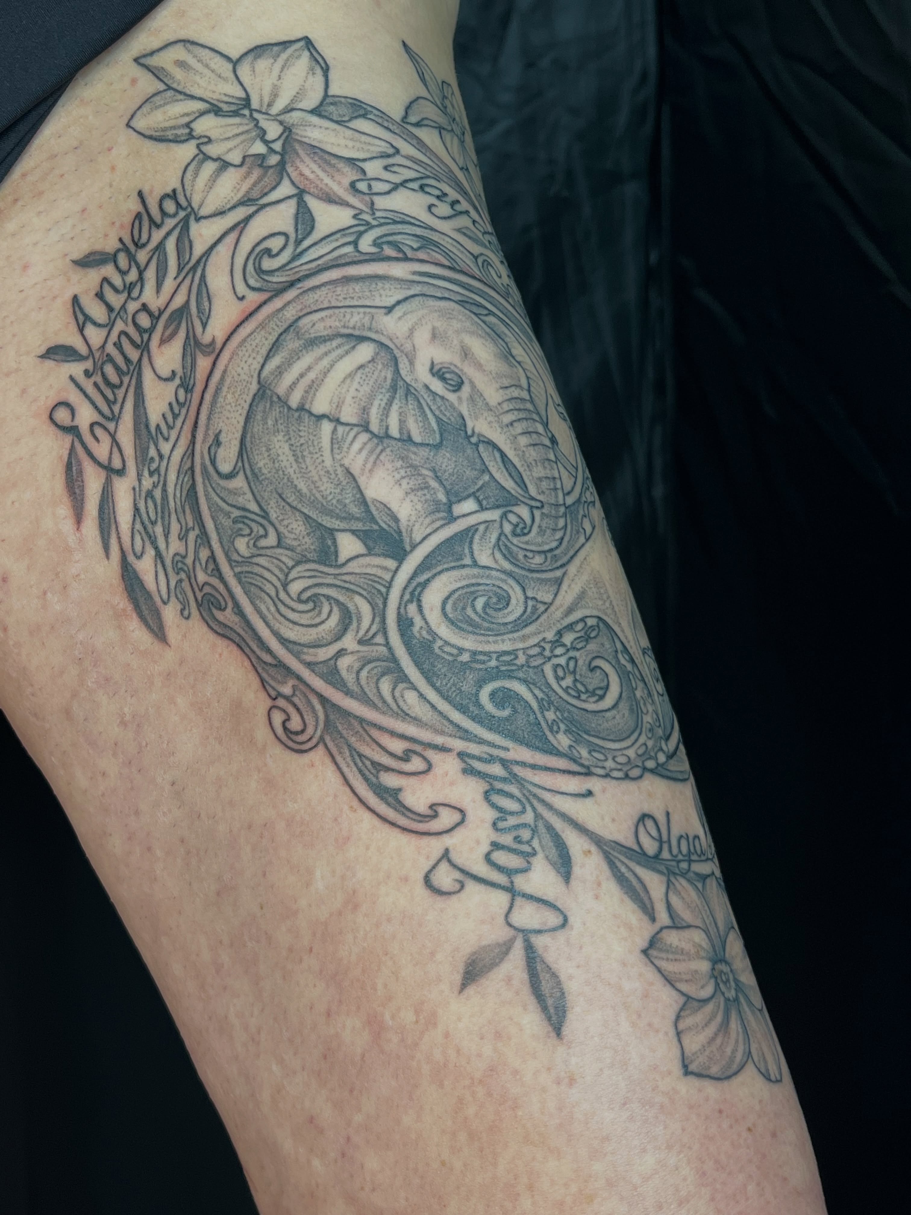 Elephant and floral dotwork tattoo on the thigh by Simón, Newington, Connecticut