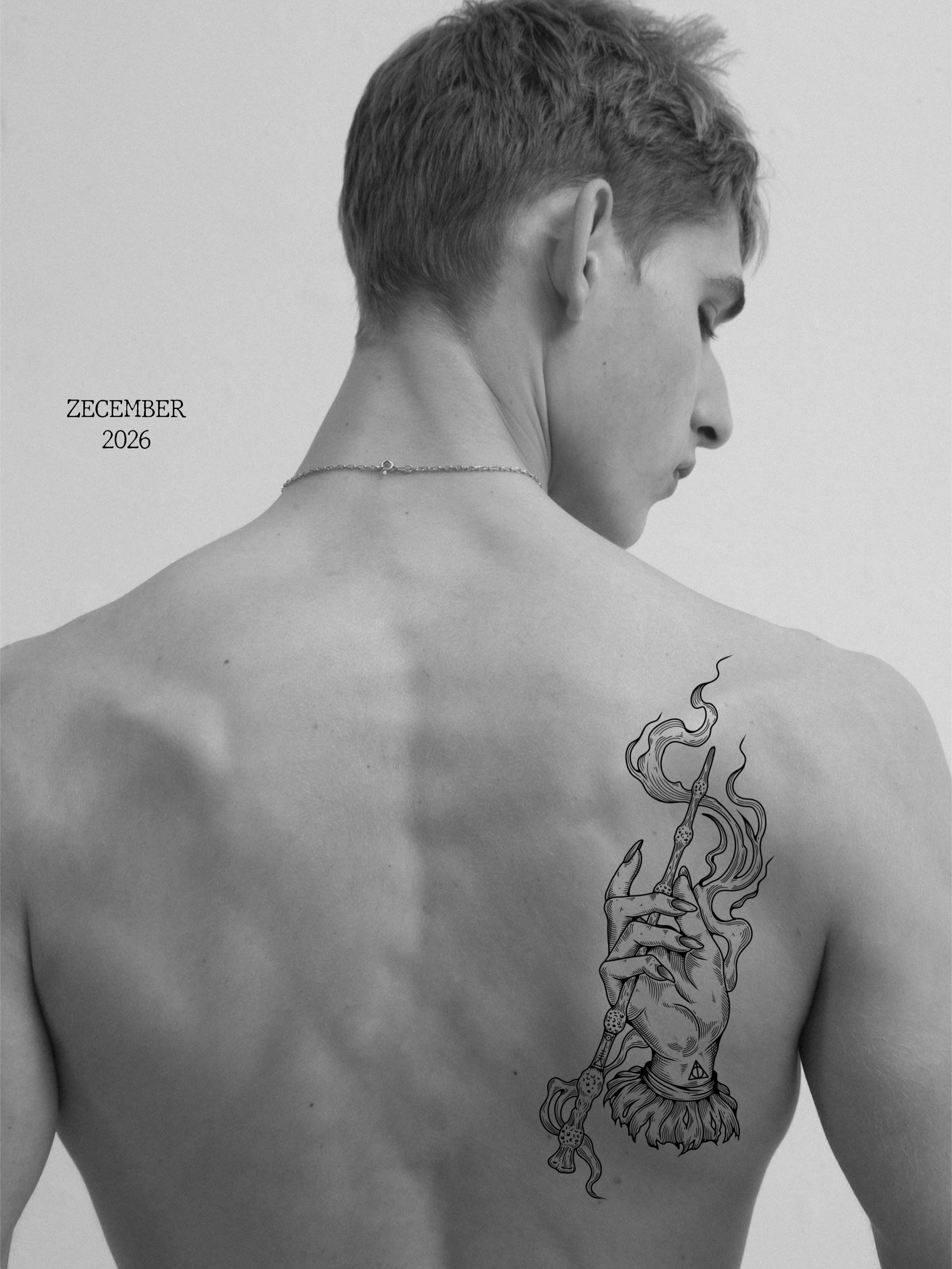Hand holding smoking pipe black and grey tattoo on the back by Zecember