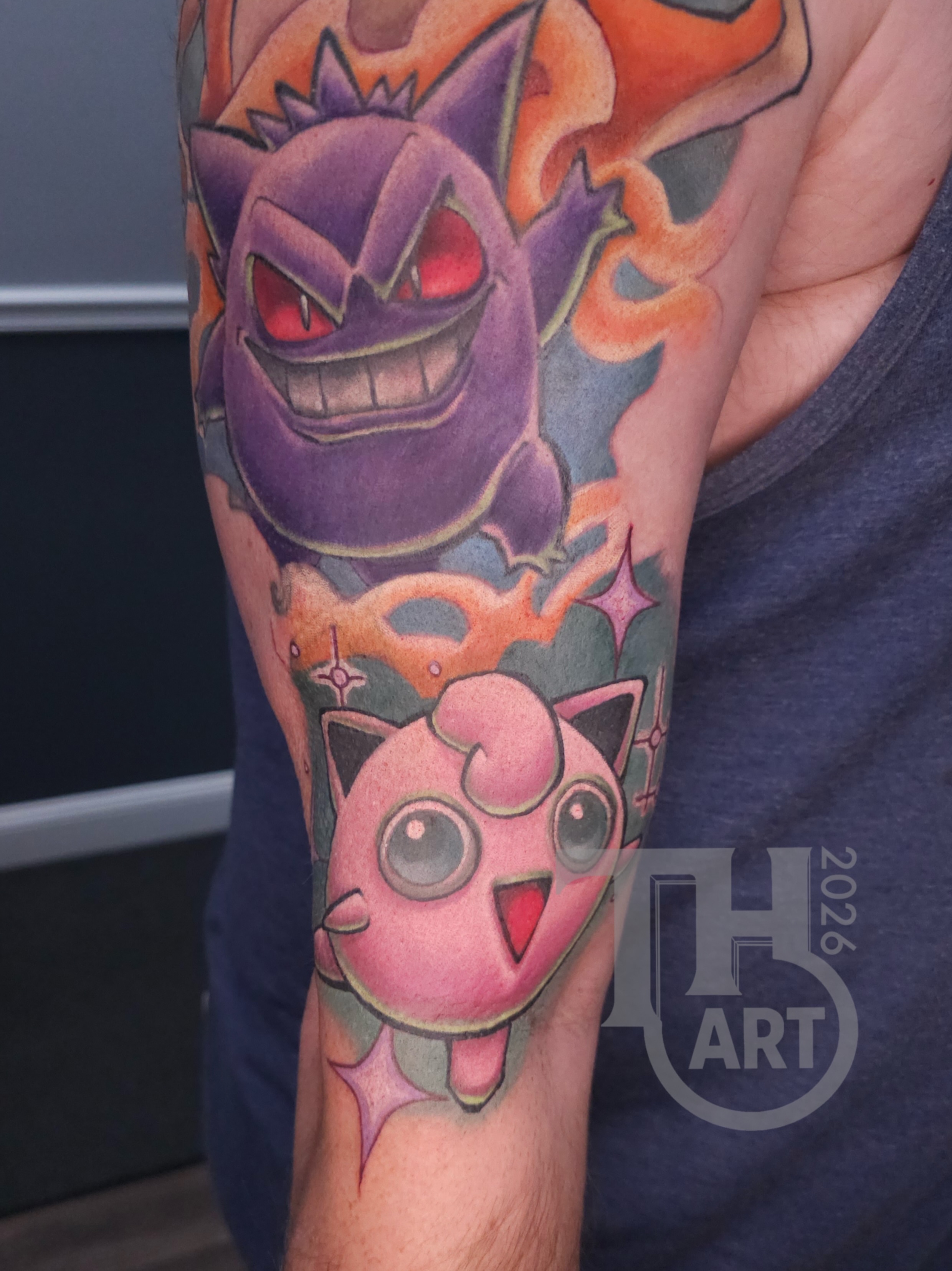 Gengar and Jigglypuff realism tattoo on the forearm by Thomas Harris