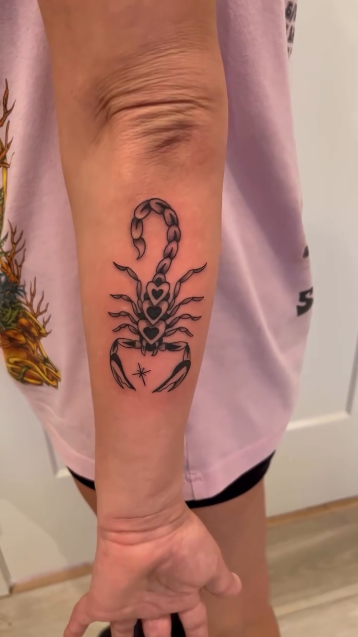 Scorpion tattoo with hearts fine line tattoo on the forearm by DL Tats, Cape Girardeau, Missouri