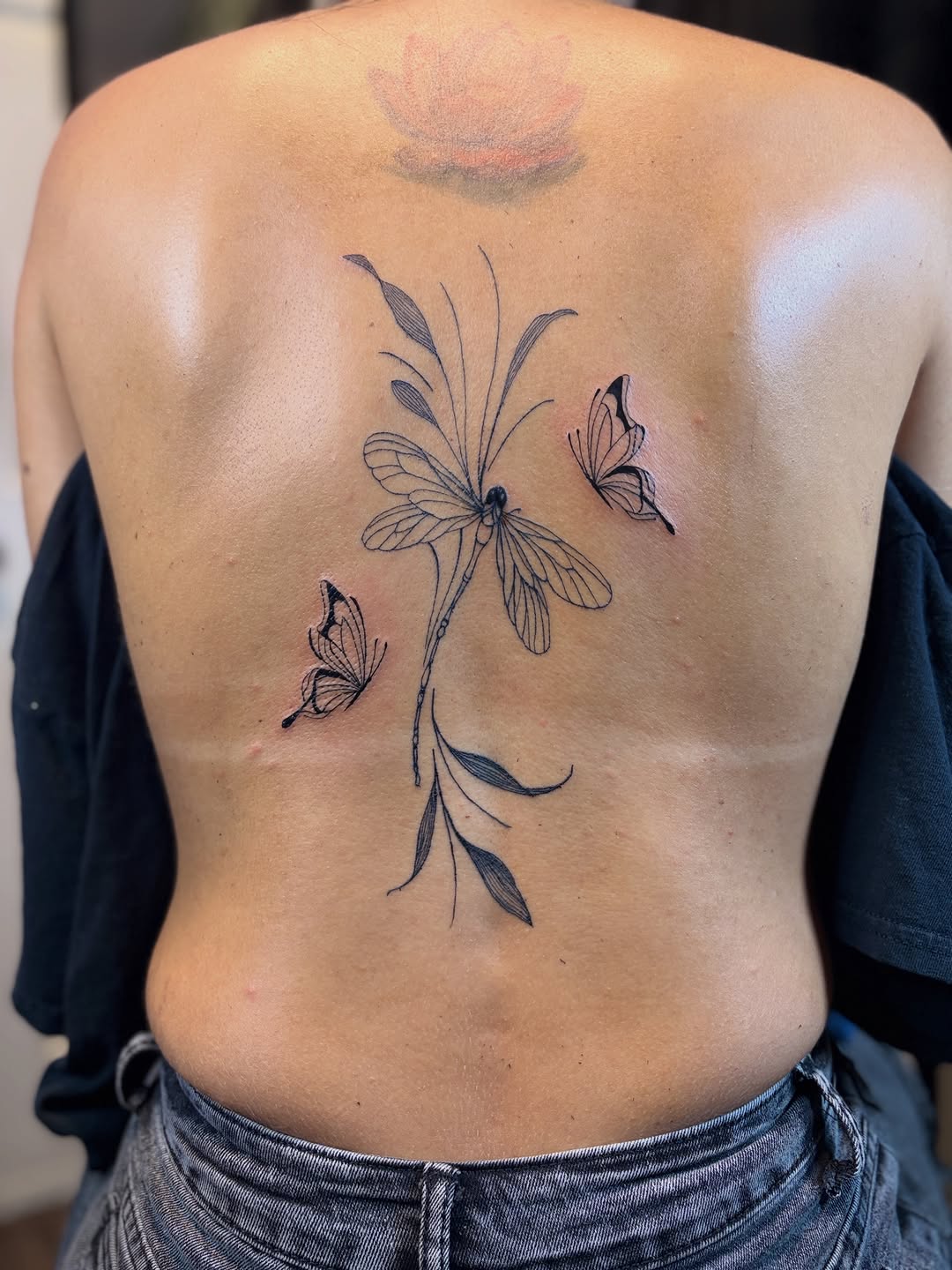 Dragonfly and butterflies fine line tattoo on the back by Khemar InspiredByLife 🇯🇲