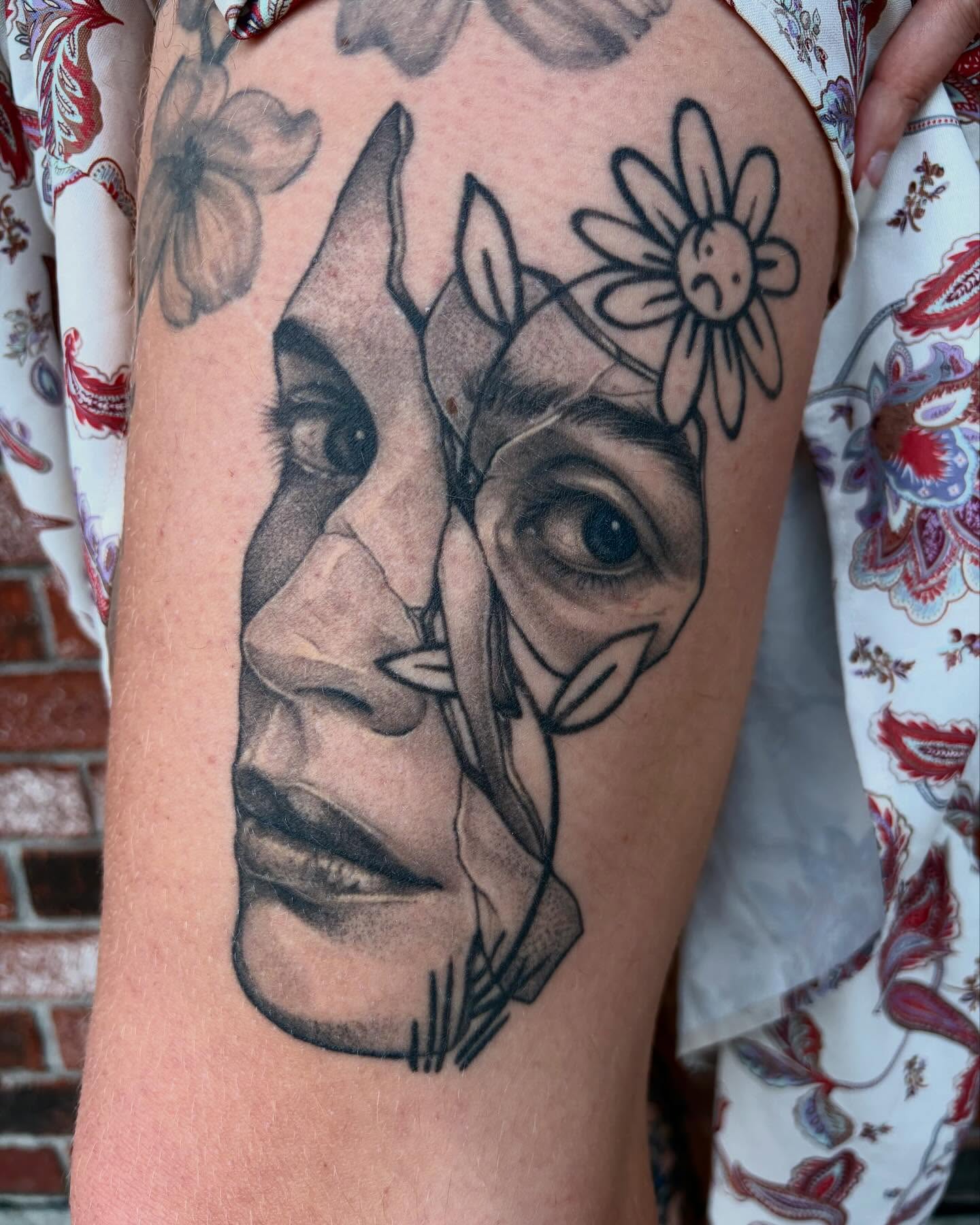 Portrait realism tattoo on the forearm by Emily Falkowski