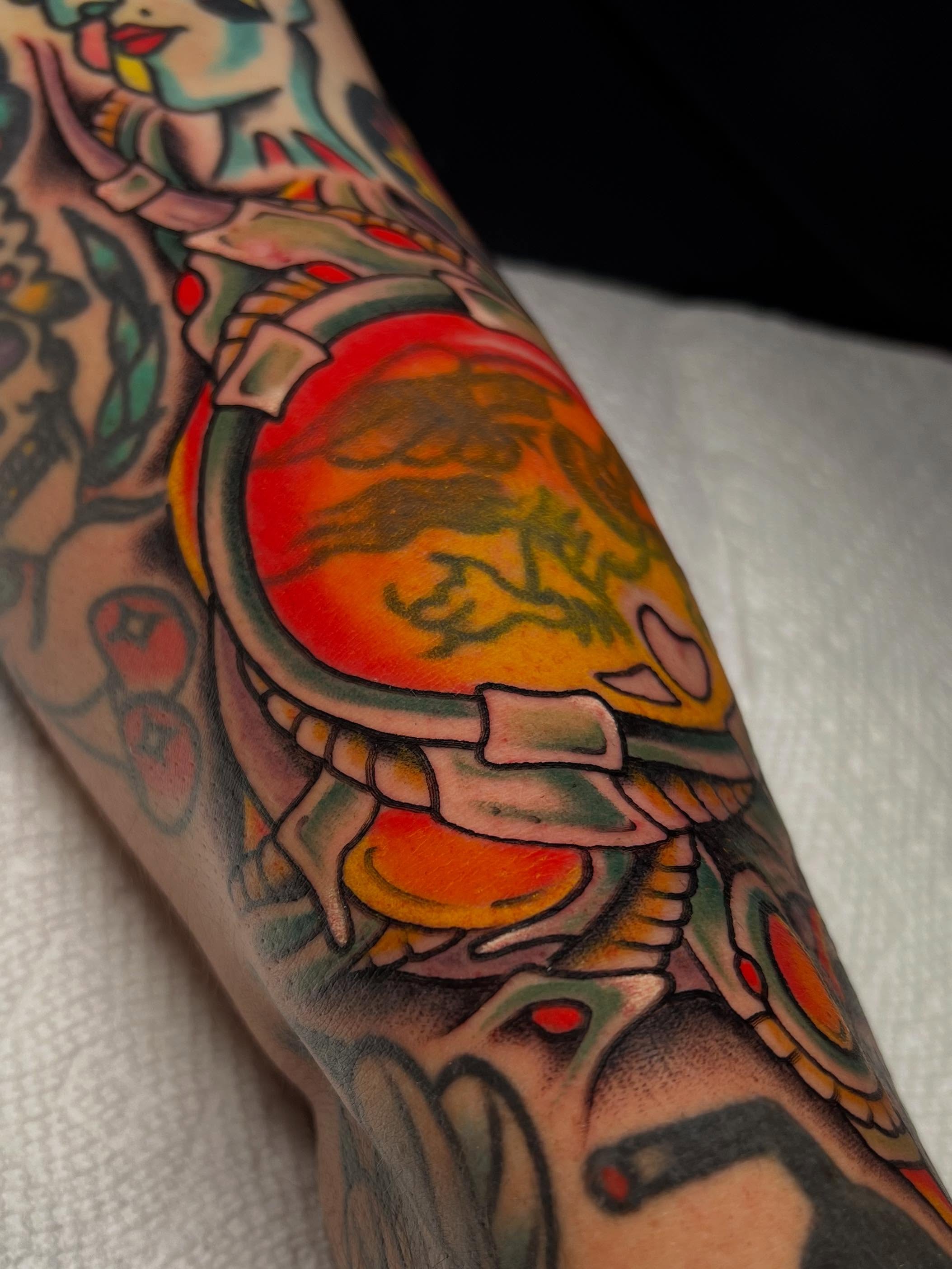 Astronaut helmet American traditional tattoo on the forearm by ᴍᴀᴛᴛ ᴀʟᴇxᴀɴᴅᴇʀ
