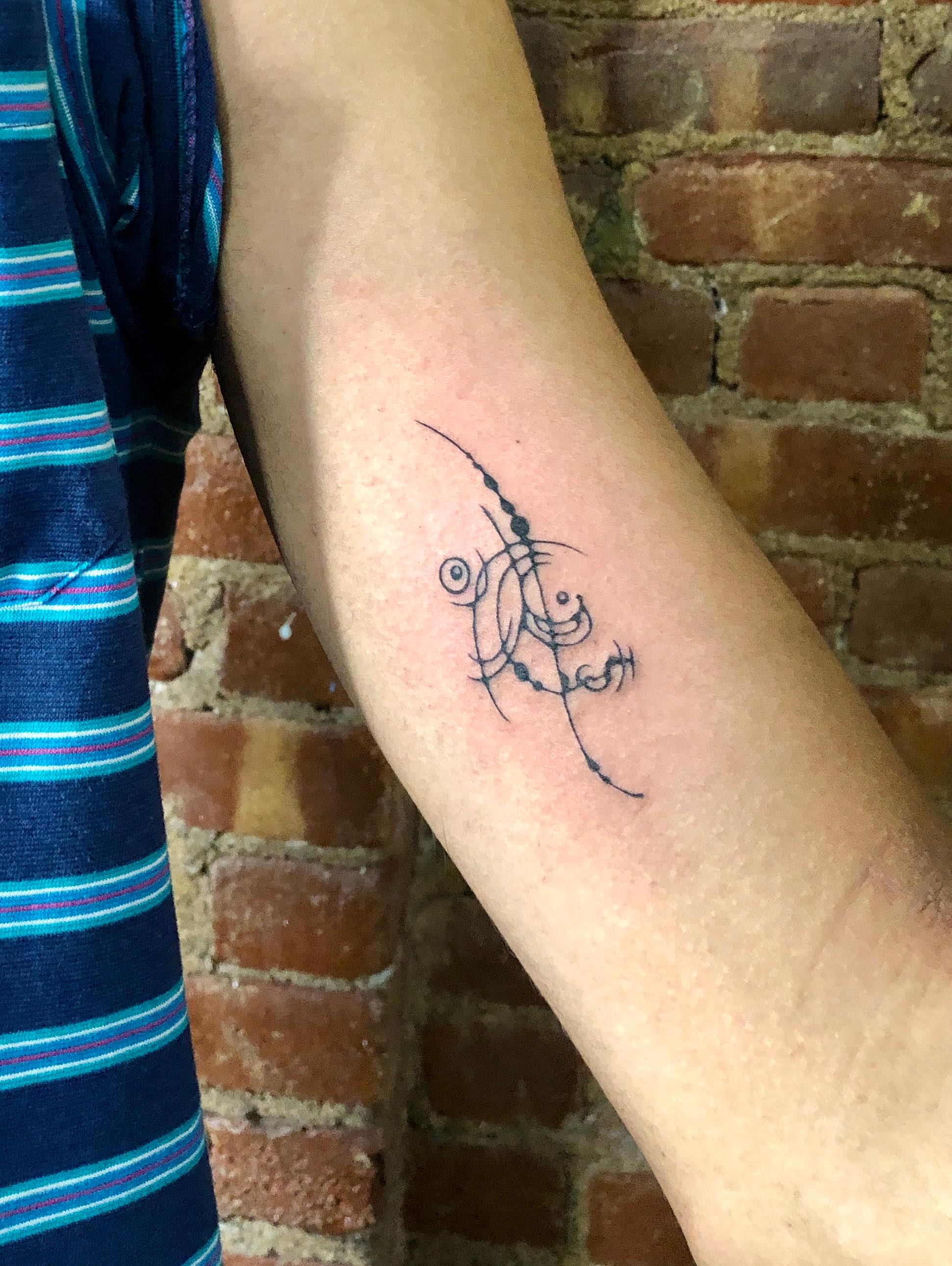 Abstract geometric design geometric tattoo on the forearm by thalia