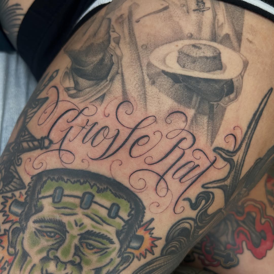 Tattoo by @salchichatattoos — lettering_script, black_and_grey