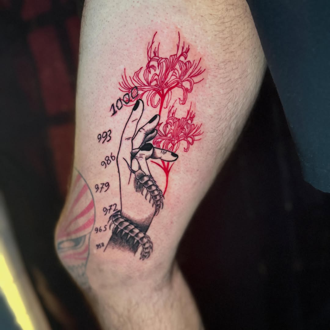 Hand with flowers black and grey tattoo on the forearm by Anime Tattoo Columbus