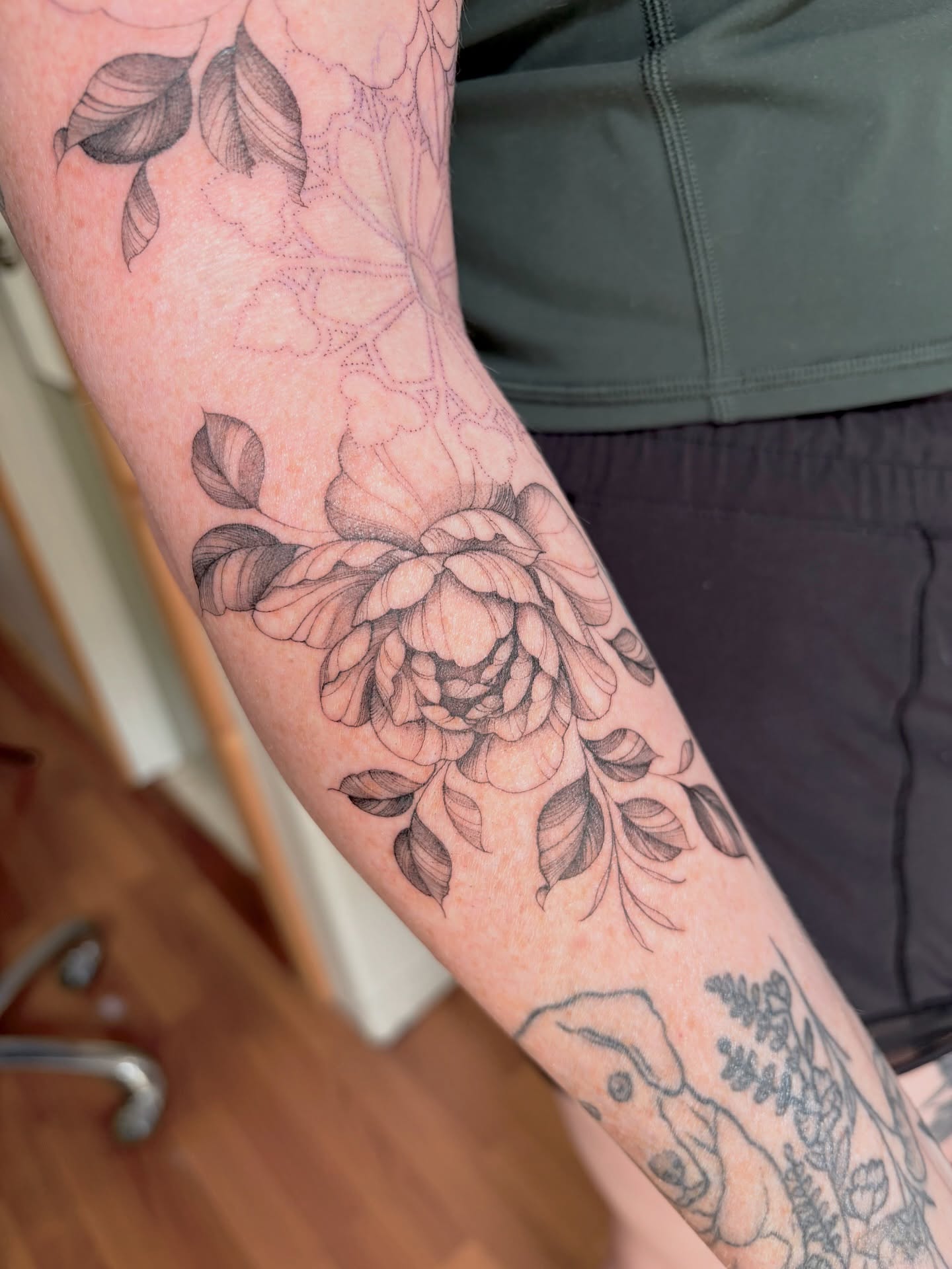 Peony black and grey tattoo on the forearm by jaclyn park