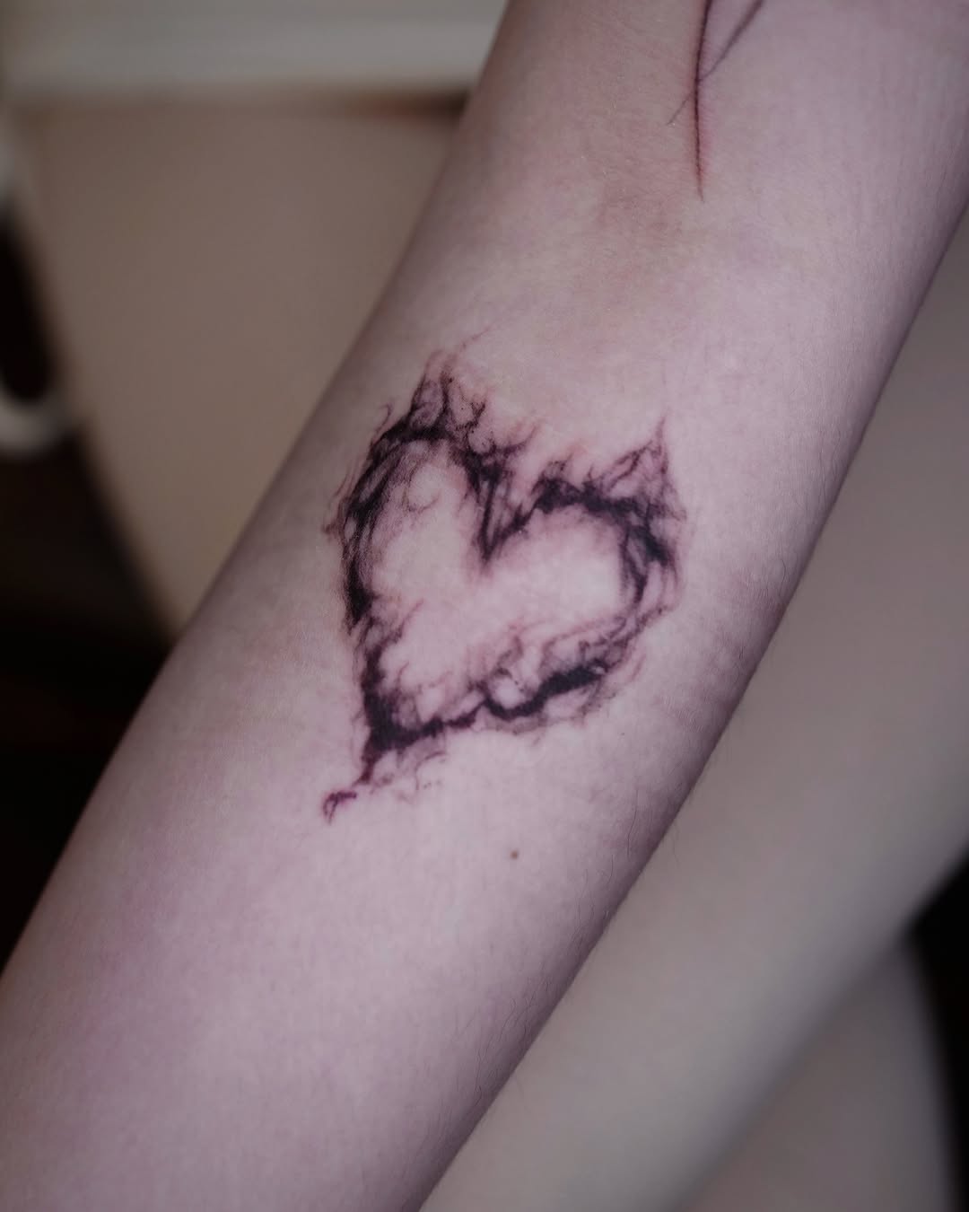 Smoky heart sketch tattoo on the forearm by @ashencoil
