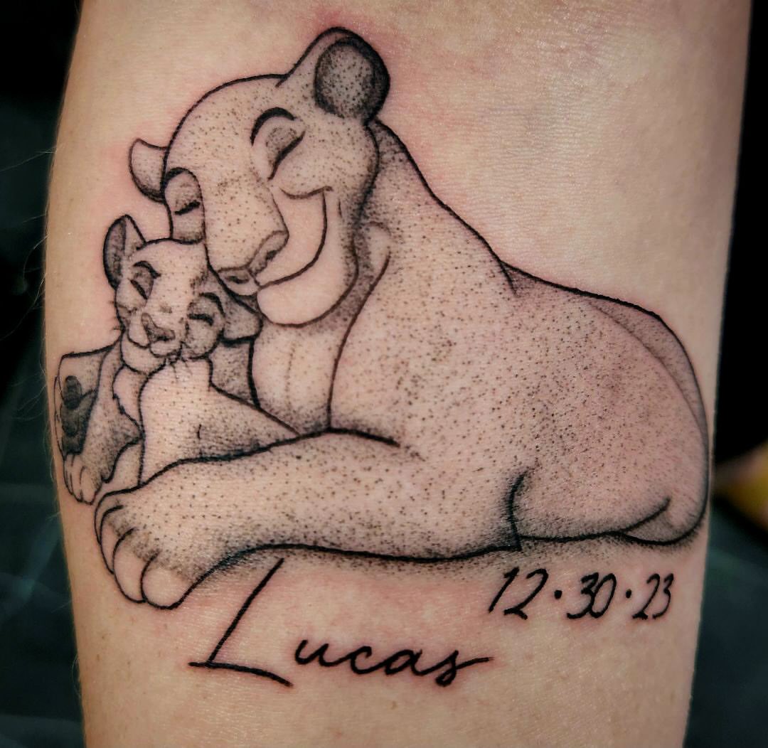 Lion and cub dotwork tattoo on the forearm by 3rd Eye Tattoo and Art Gallery