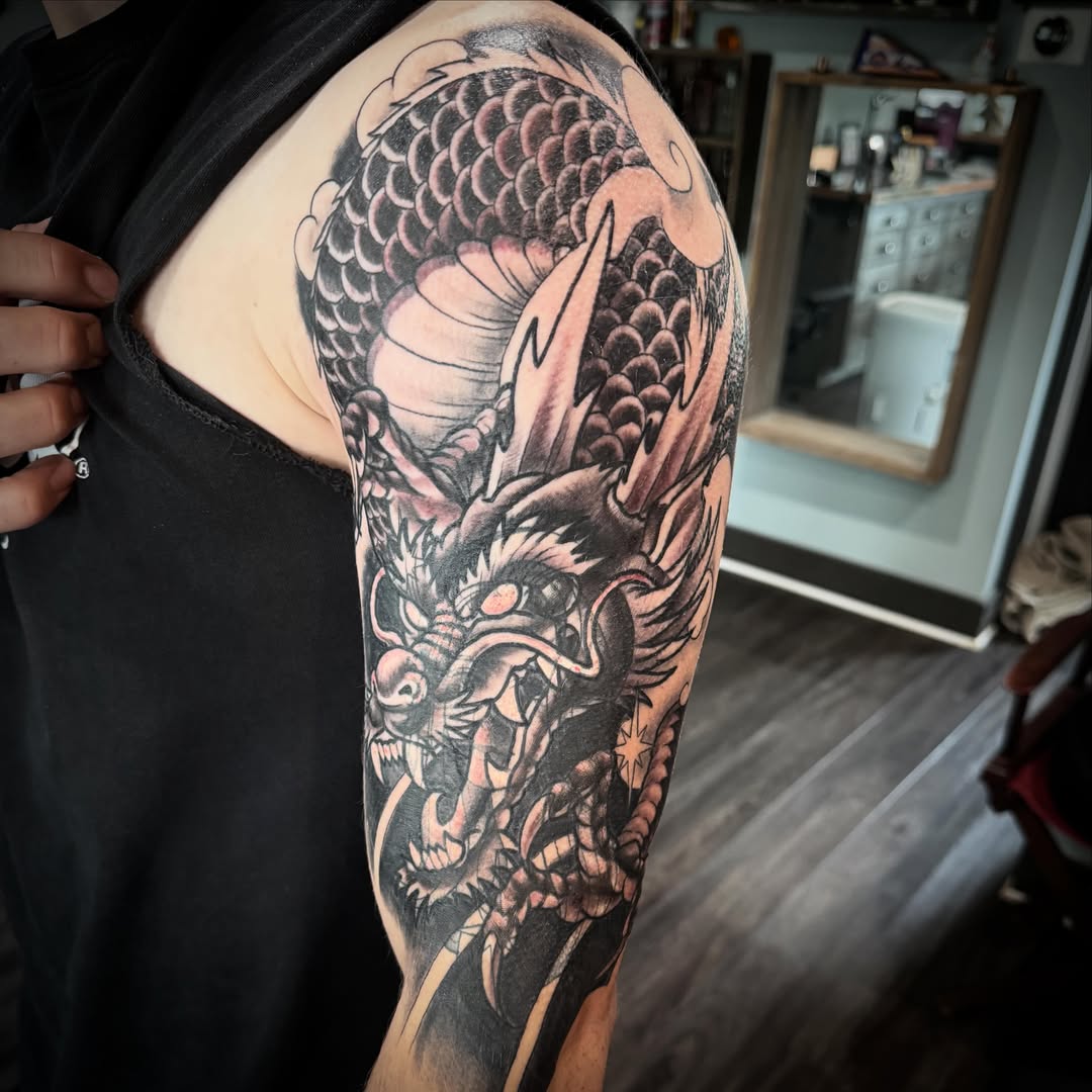 Dragon japanese irezumi tattoo on the upper arm by Cory Haberman