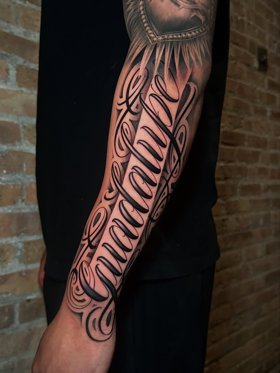 Tattoo by @tattoosbymiguel — lettering_script, chicano