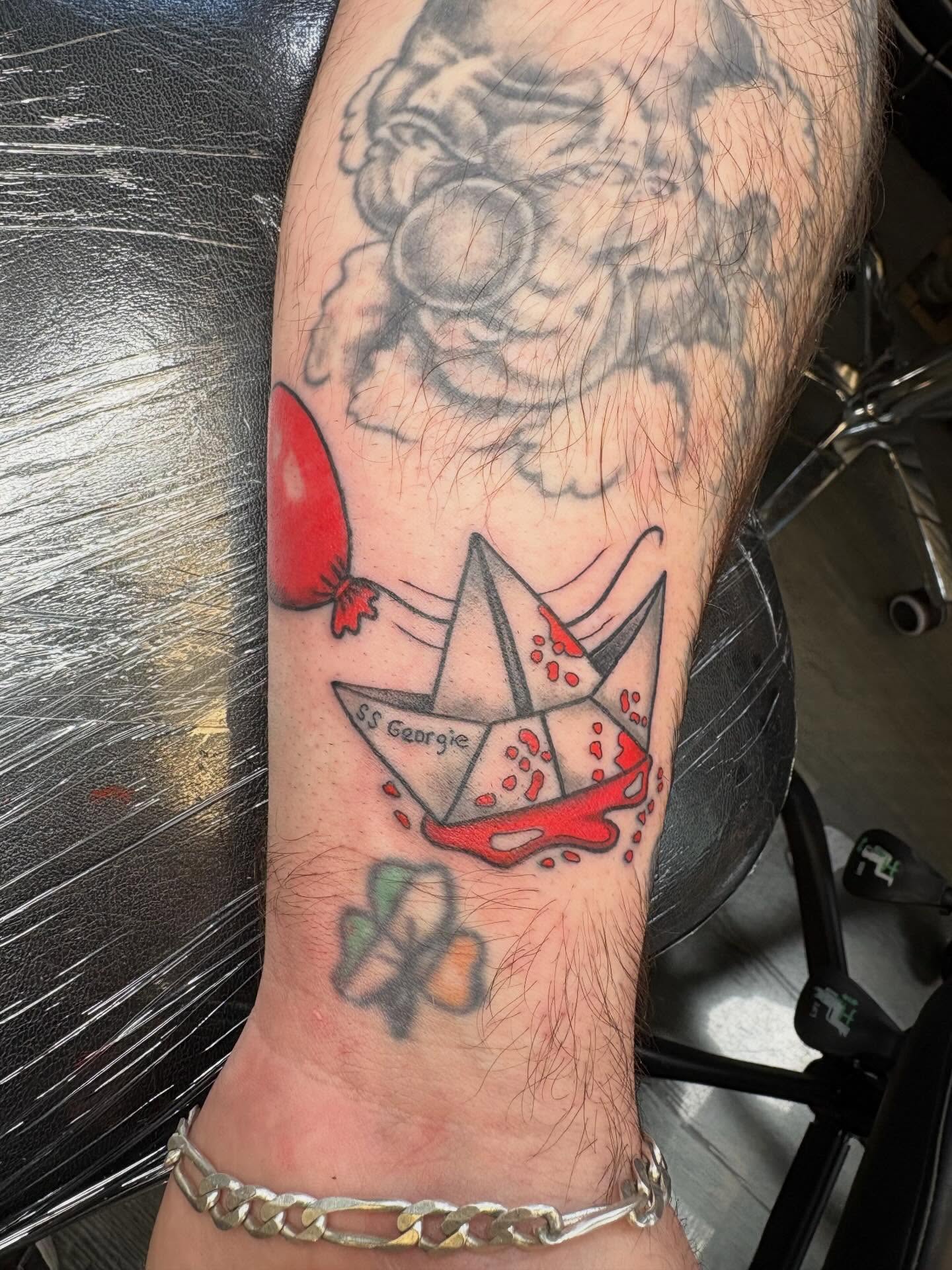 Paper boat neo-traditional tattoo on the forearm by Gardner, Gardner, Massachusetts