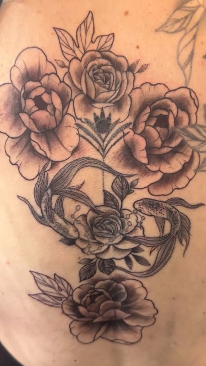 Roses and snakes dotwork tattoo on the back by Teagan Rachel, Millcreek, Utah