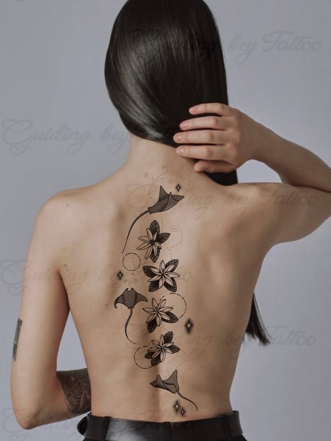 Stingrays and flowers blackwork tattoo on the back by ✨Tattoos By Martina ✨