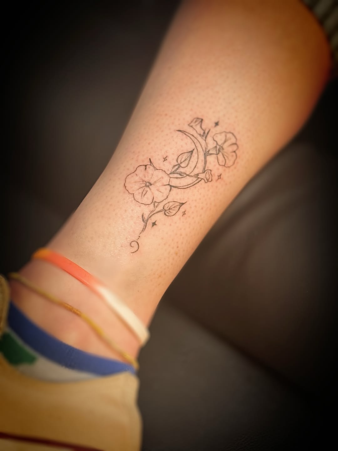 Moon and flowers fine line tattoo on the forearm by Meagan, Charlotte, North Carolina
