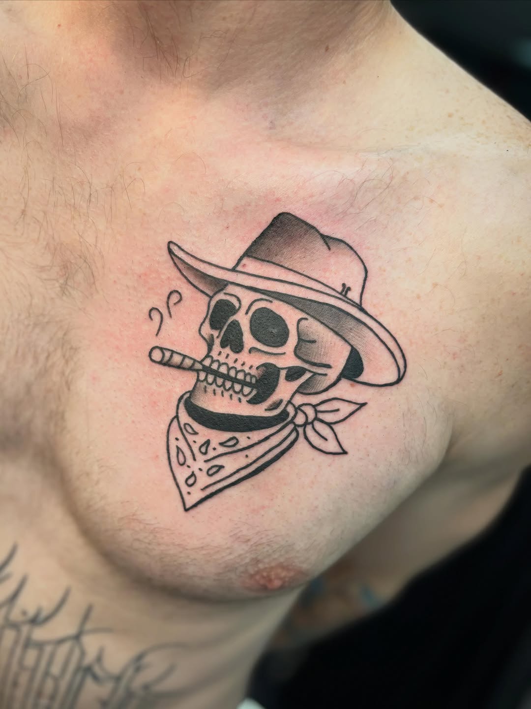 Skull with cowboy hat and bandana realism tattoo on the chest by ππ‘ππ―π² πππ₯π₯ππ²