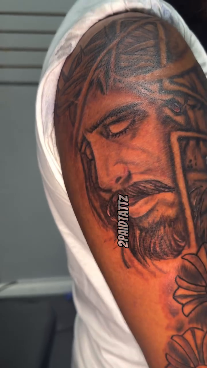 Jesus Christ and a lion realism tattoo on the forearm by 2PaidTattz