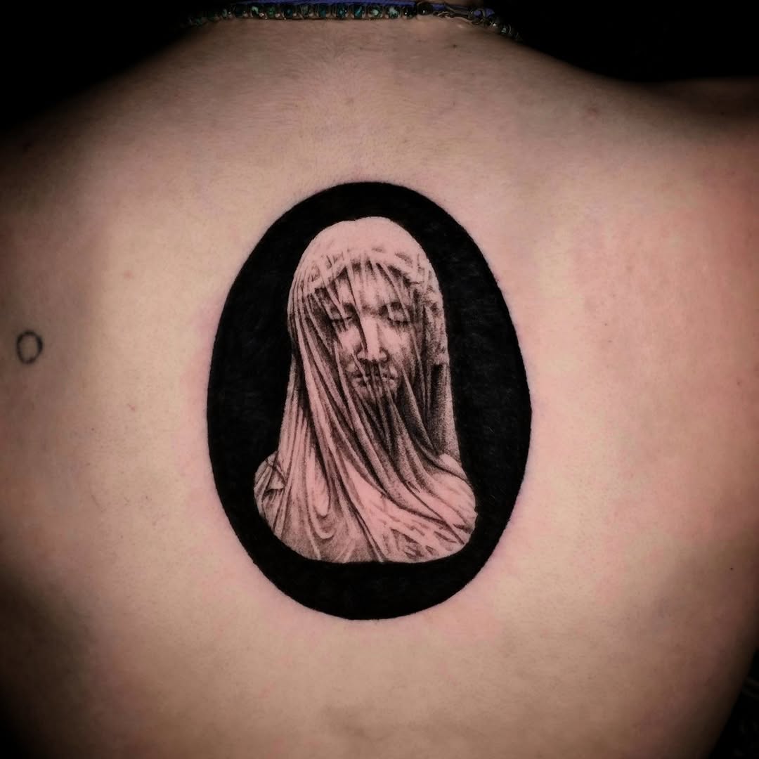 Veiled woman bust dark art tattoo on the back by Nick de Hoyos